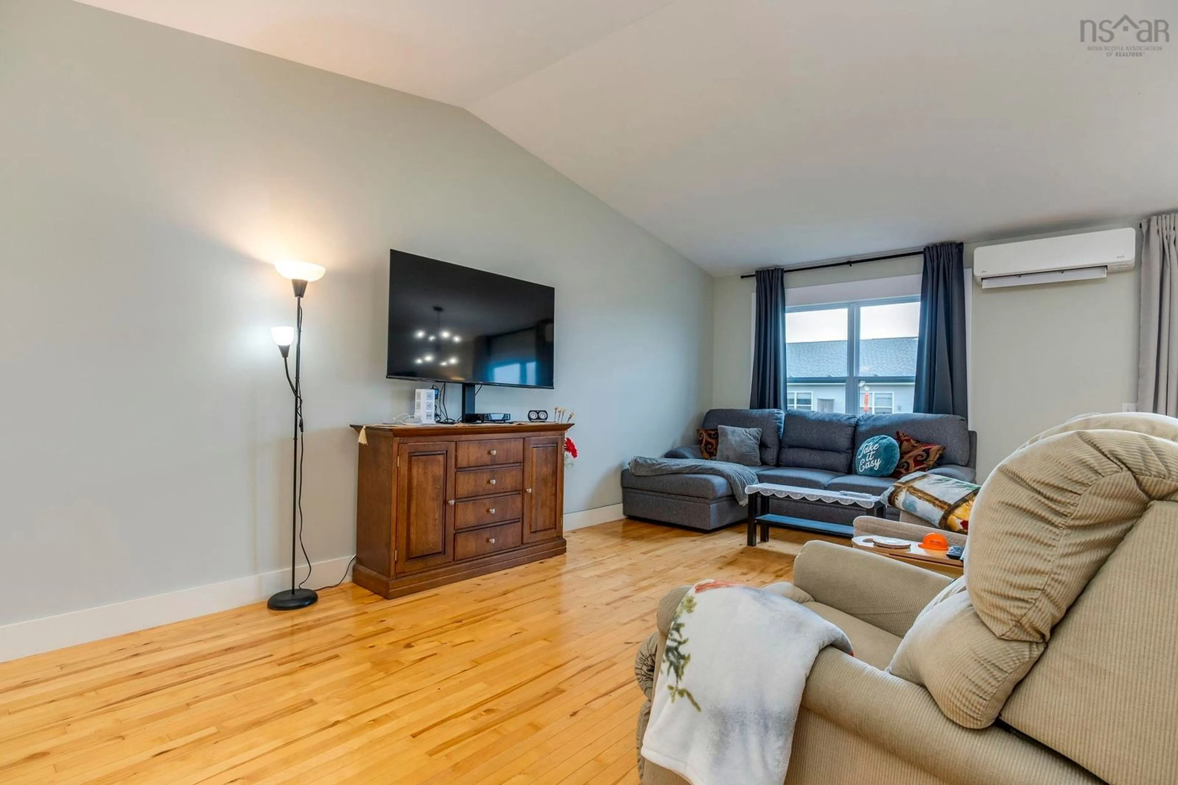 Living room with furniture, wood/laminate floor for 75 Sailors Trail, Eastern Passage Nova Scotia B3G 0A2