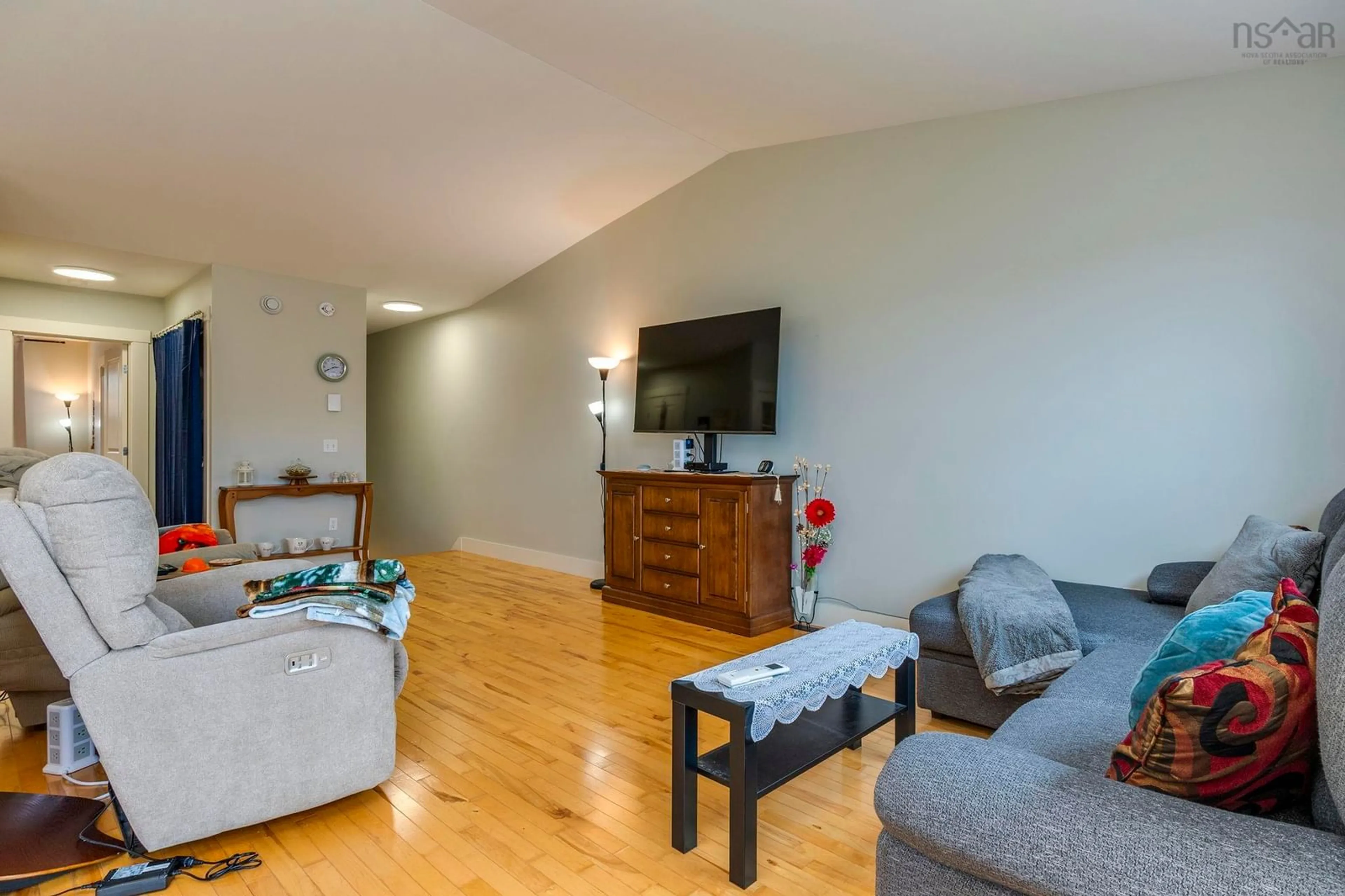 Living room with furniture, wood/laminate floor for 75 Sailors Trail, Eastern Passage Nova Scotia B3G 0A2