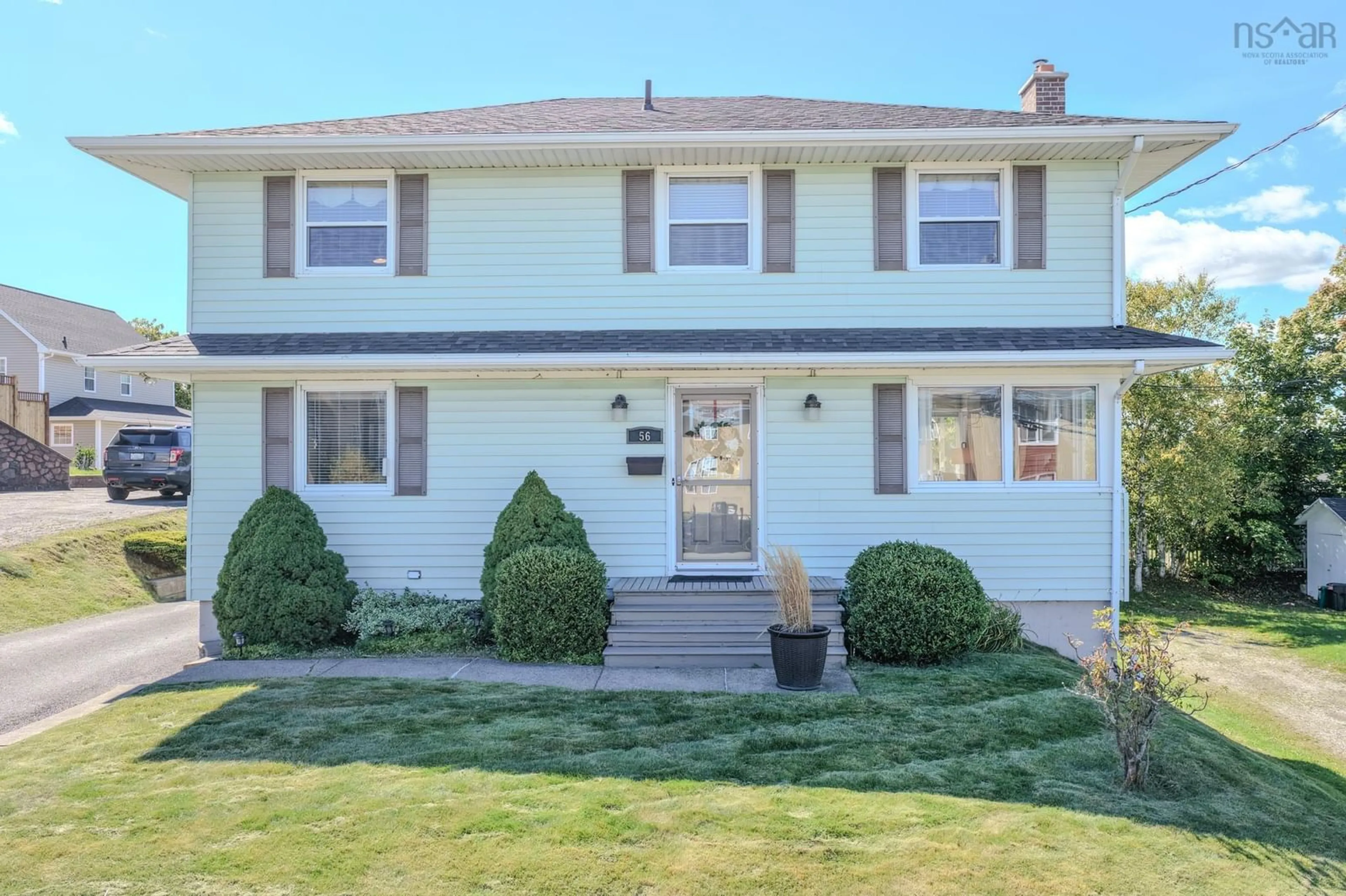 Home with vinyl exterior material, street for 56 Churchill Dr, Sydney Nova Scotia B1S 2B3
