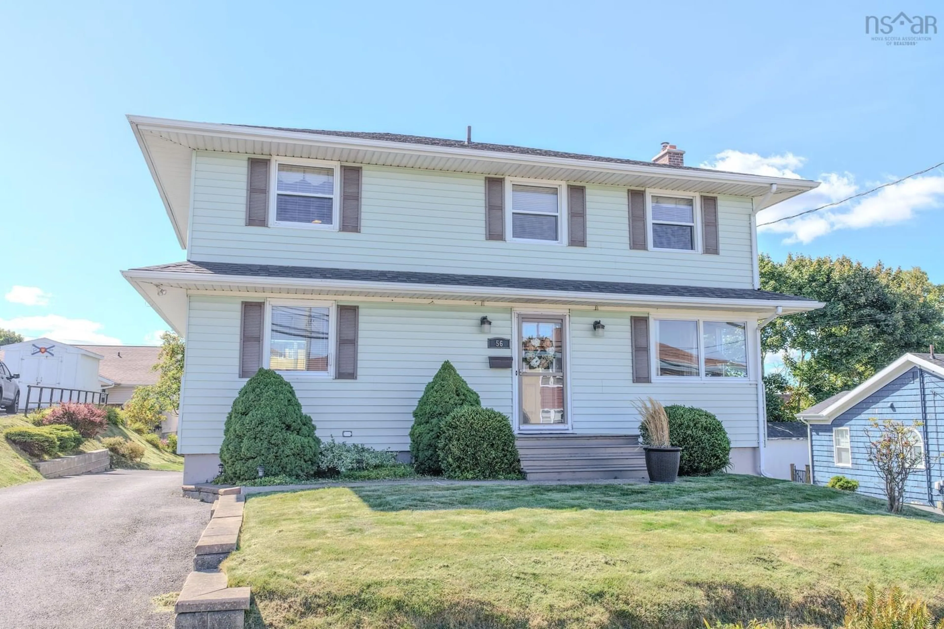 Home with vinyl exterior material, street for 56 Churchill Dr, Sydney Nova Scotia B1S 2B3
