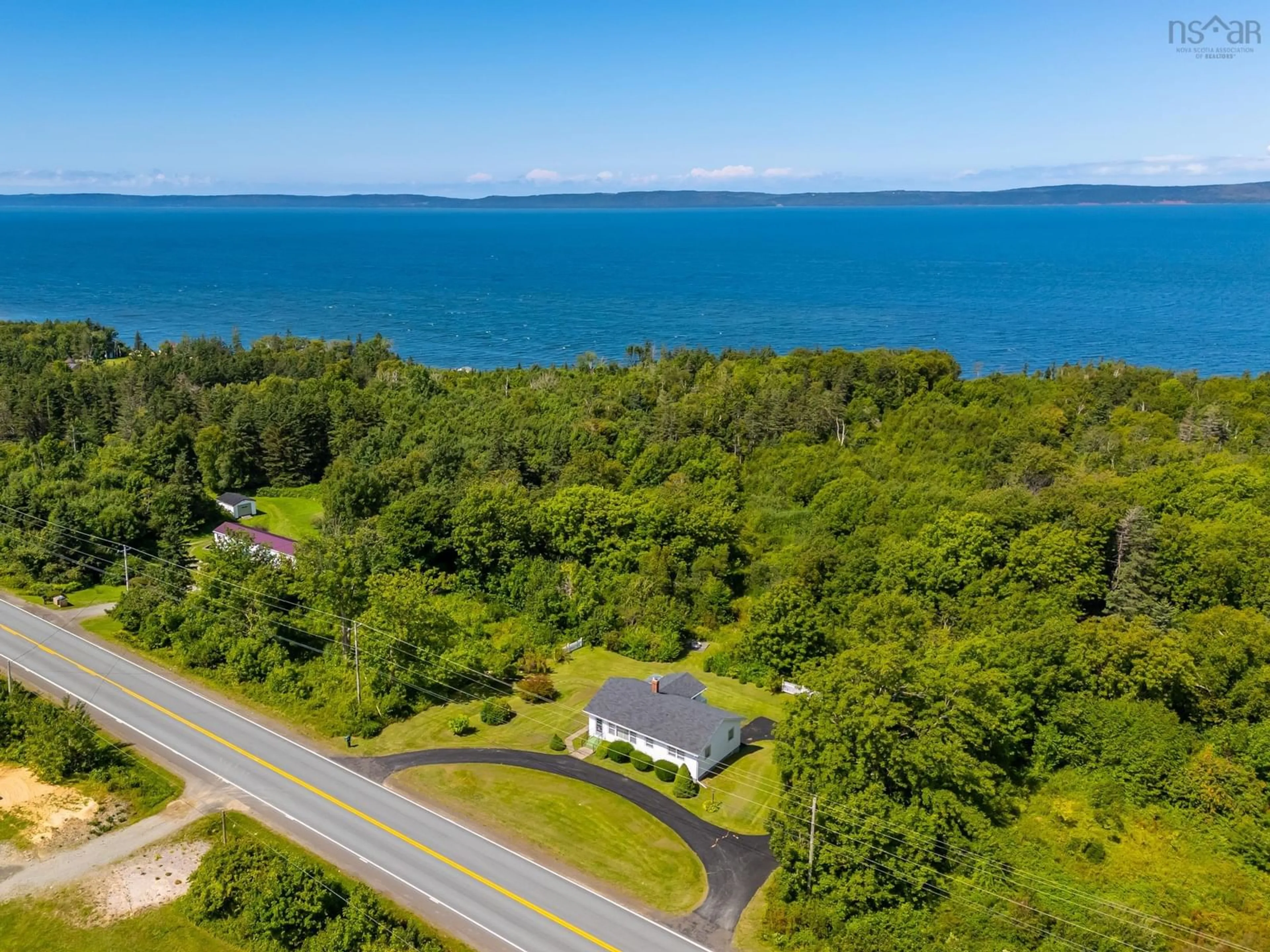 A pic from outside/outdoor area/front of a property/back of a property/a pic from drone, water/lake/river/ocean view for 7527 Highway 101, Plympton Nova Scotia B0W 2R0