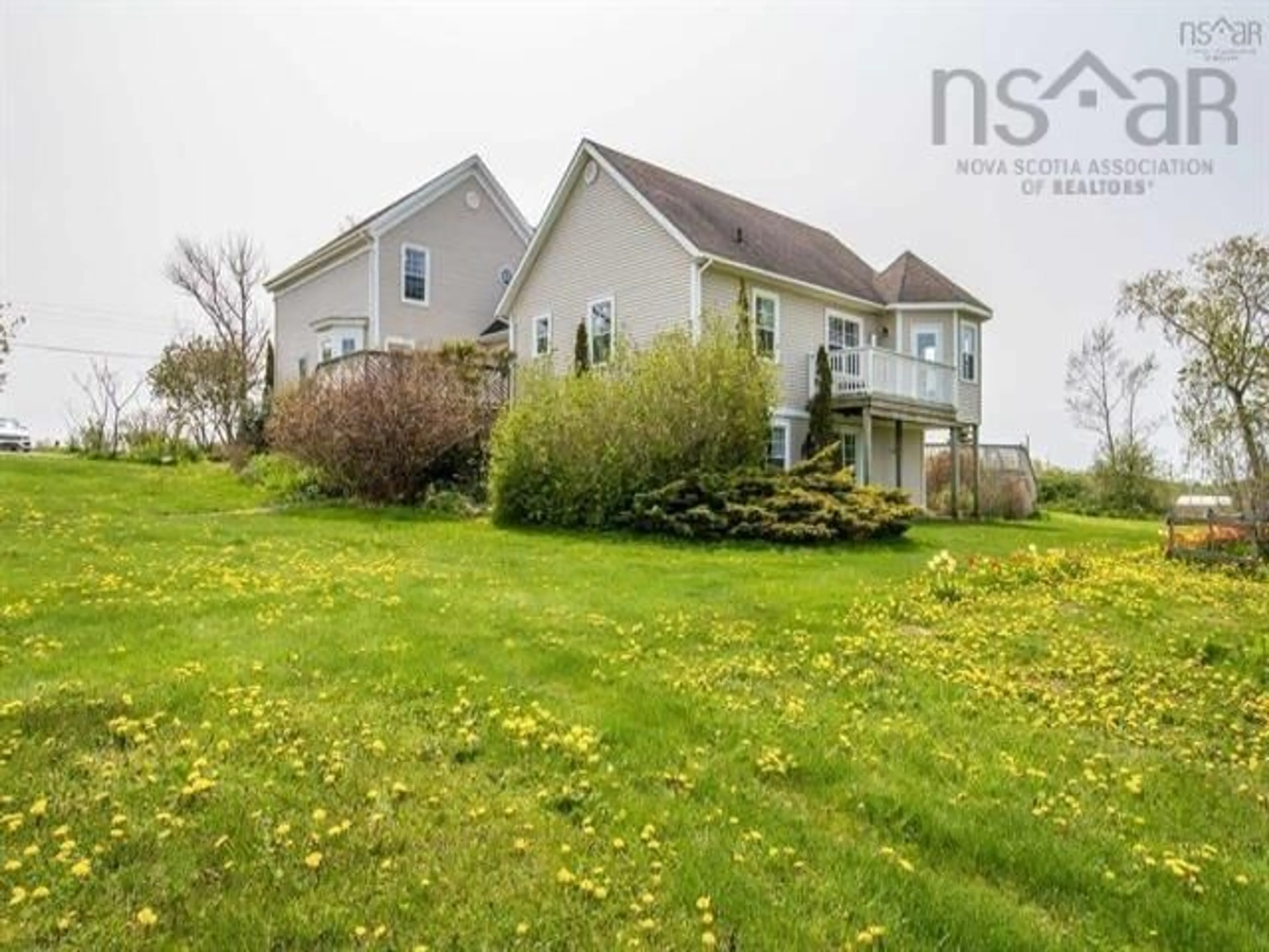 A pic from outside/outdoor area/front of a property/back of a property/a pic from drone, water/lake/river/ocean view for 53 King St, Hortonville Nova Scotia B4P 2R3