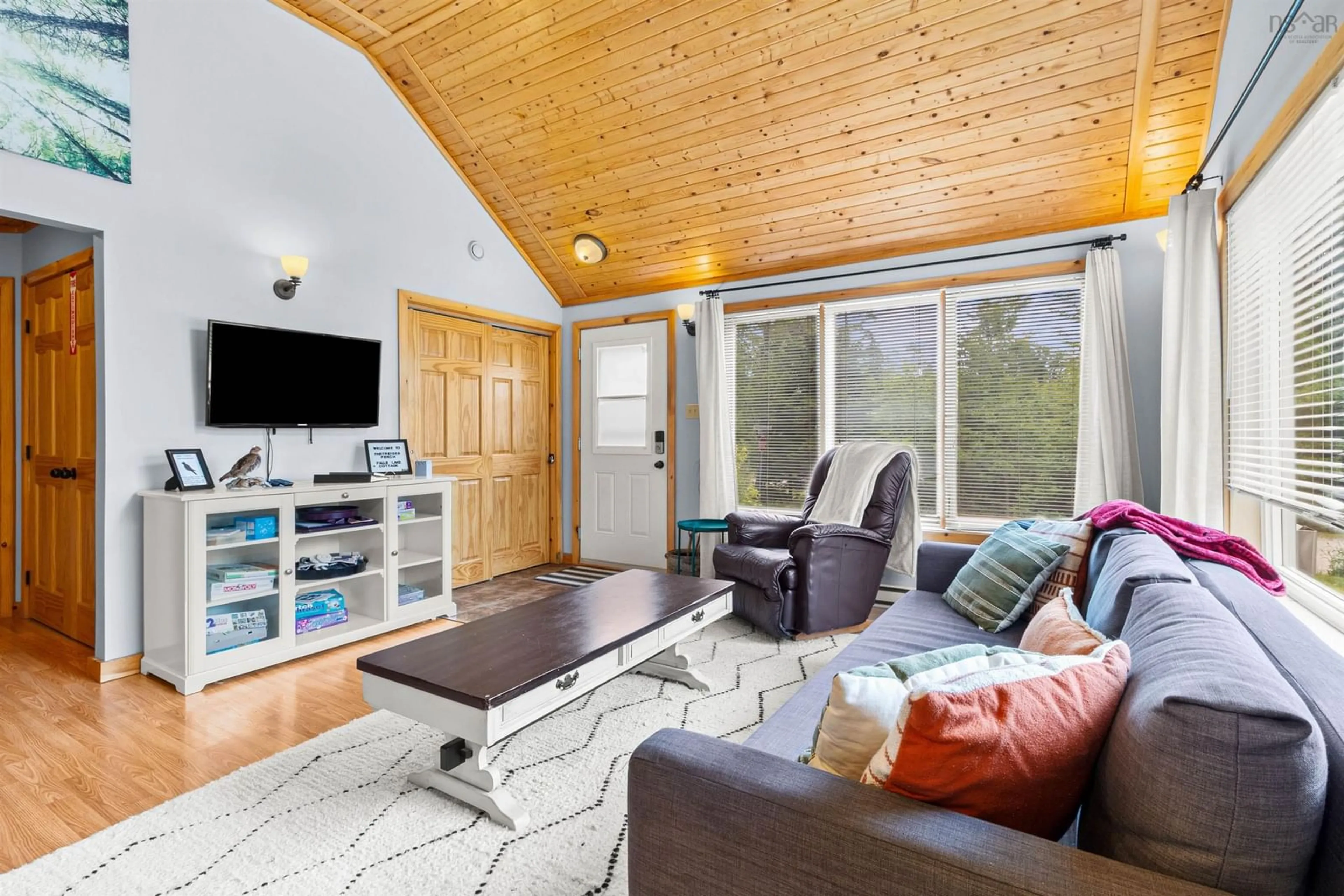 Living room with furniture, wood/laminate floor for 6 Partridge Lane #47, Vaughan Nova Scotia B0N 2T0