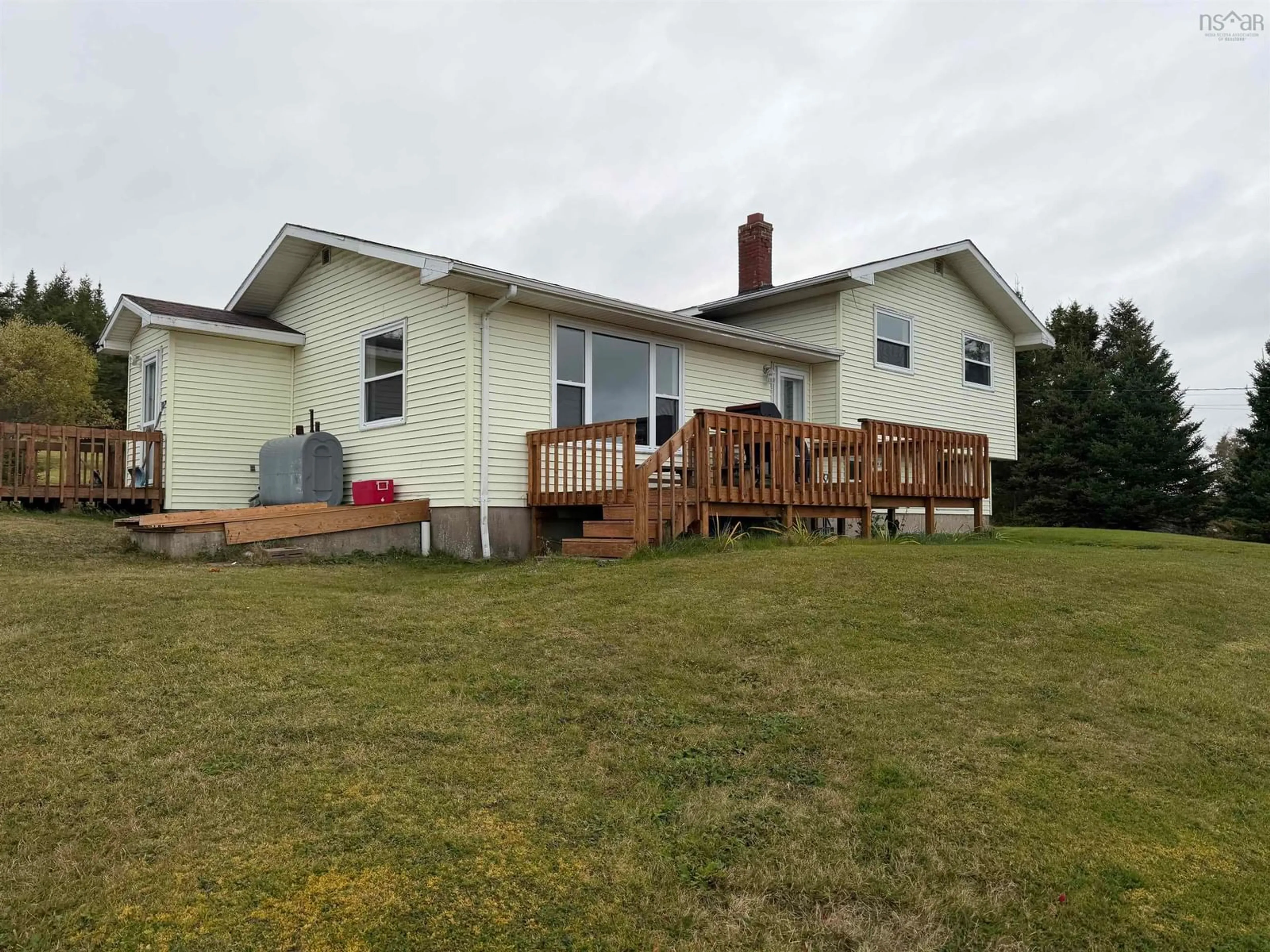 A pic from outside/outdoor area/front of a property/back of a property/a pic from drone, building for 7900 Upper Grand Mira Rd, Grand Mira North Nova Scotia B1K 1L9