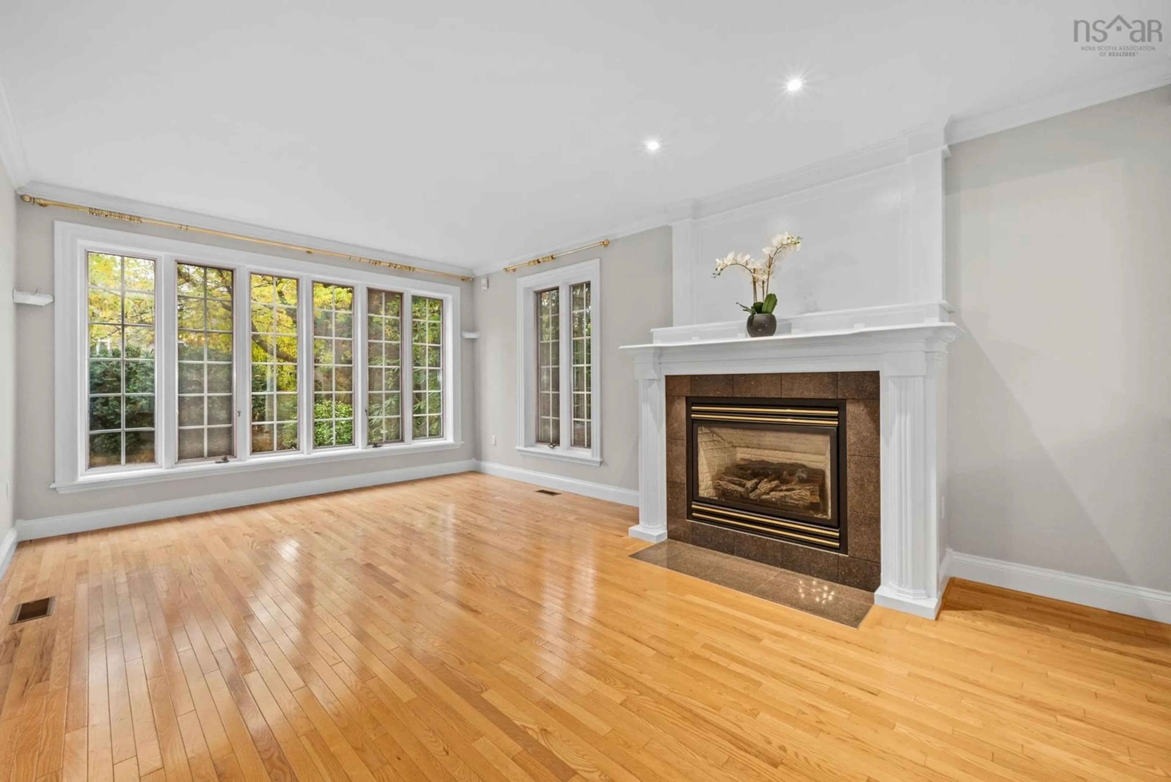 Living room with furniture, wood/laminate floor for 916 Young Ave, Halifax Nova Scotia B3H 2W1