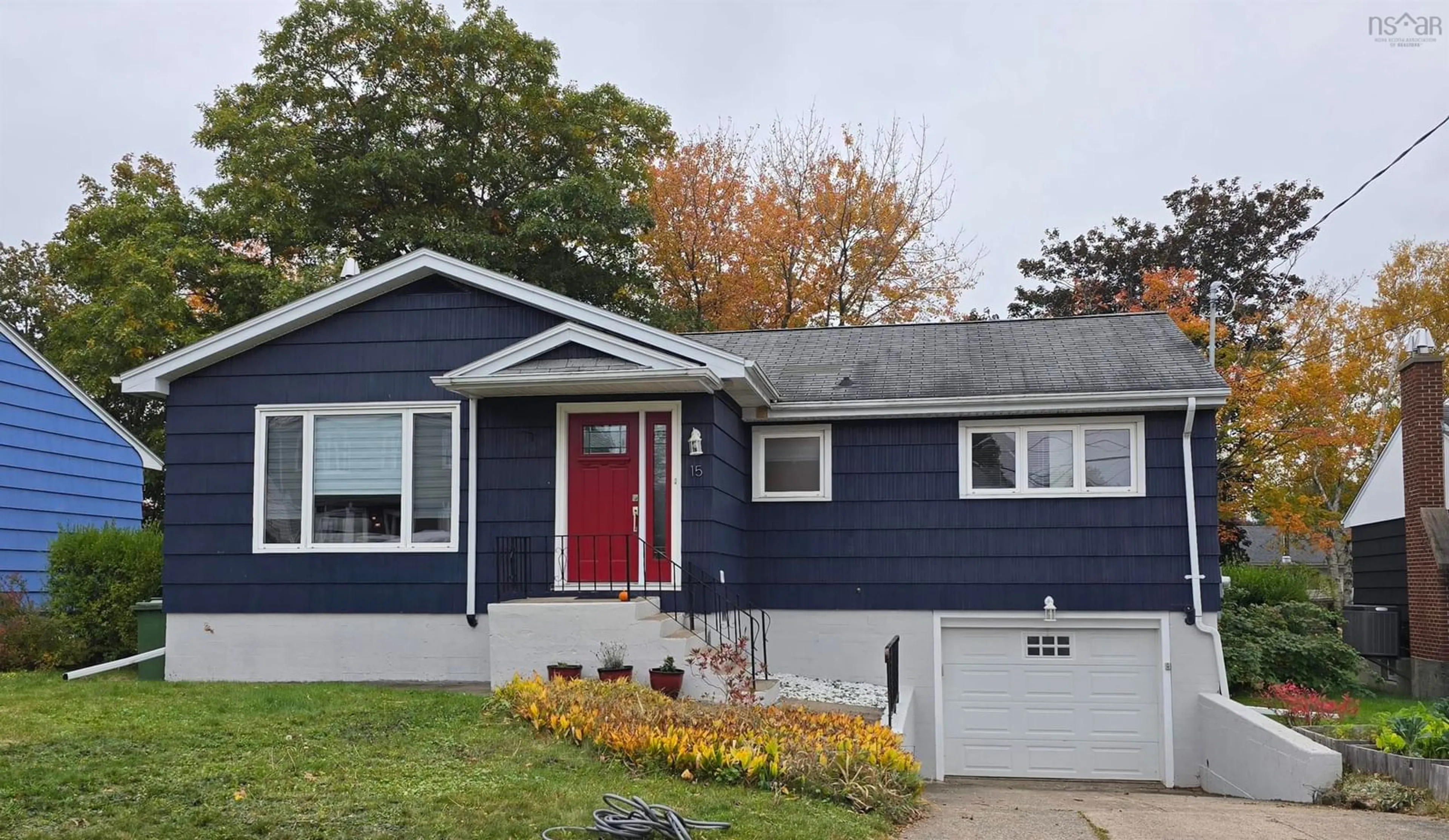 Home with vinyl exterior material, street for 15 Laurier St, Dartmouth Nova Scotia B3A 2G6