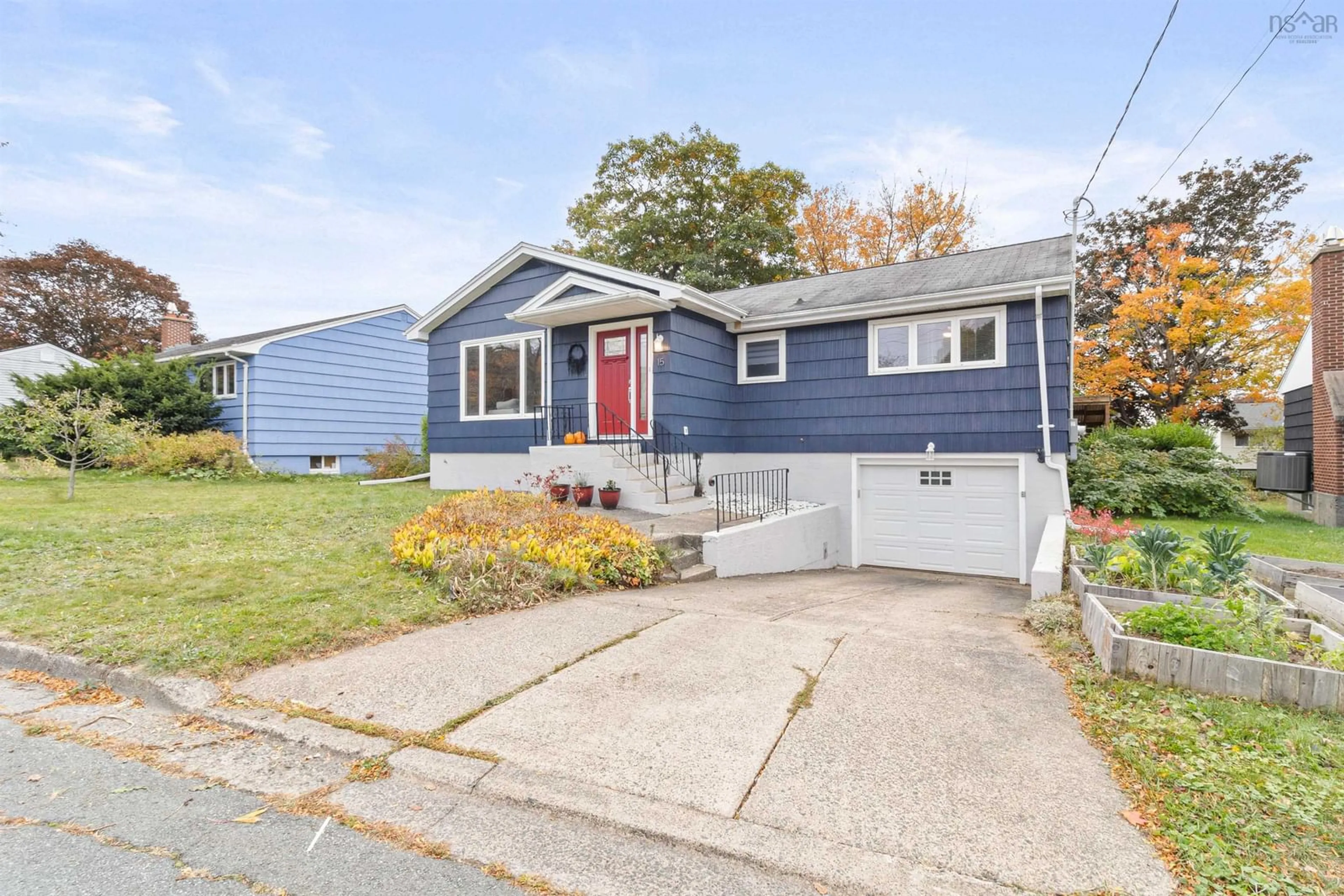 Home with vinyl exterior material, street for 15 Laurier St, Dartmouth Nova Scotia B3A 2G6