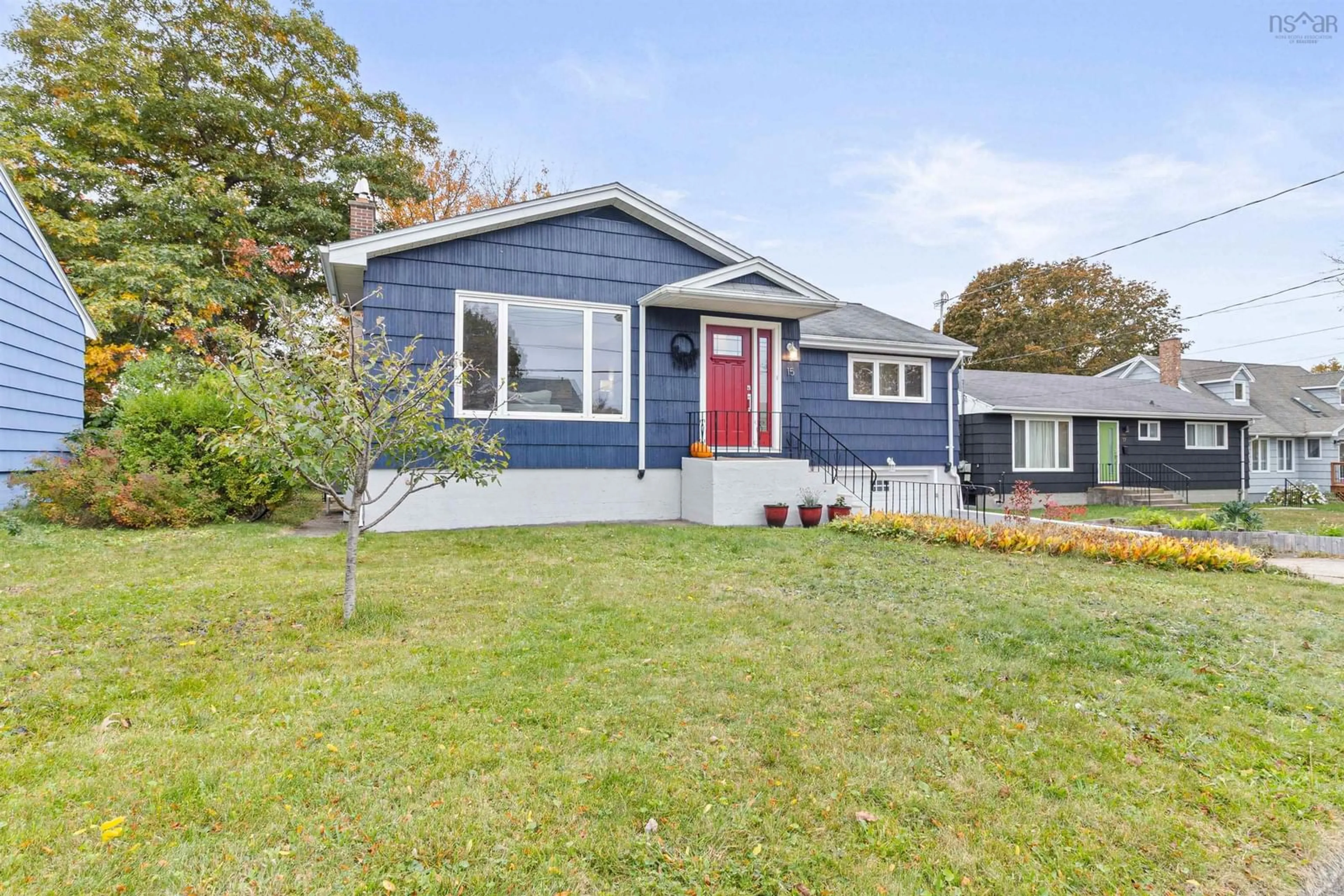 Home with vinyl exterior material, street for 15 Laurier St, Dartmouth Nova Scotia B3A 2G6
