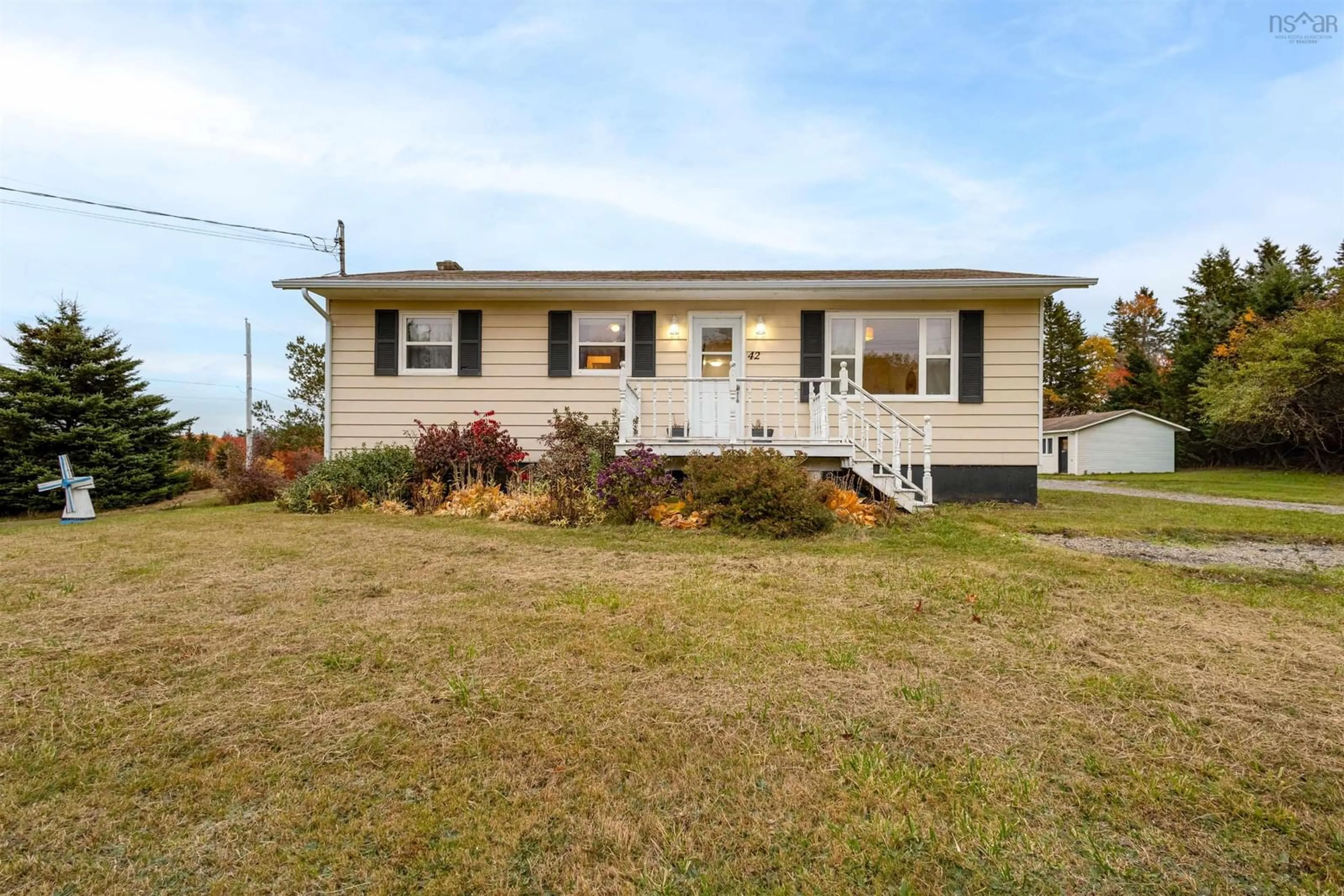 Home with vinyl exterior material, street for 42 King Grove Rd, Millville Nova Scotia B1Y 2B9