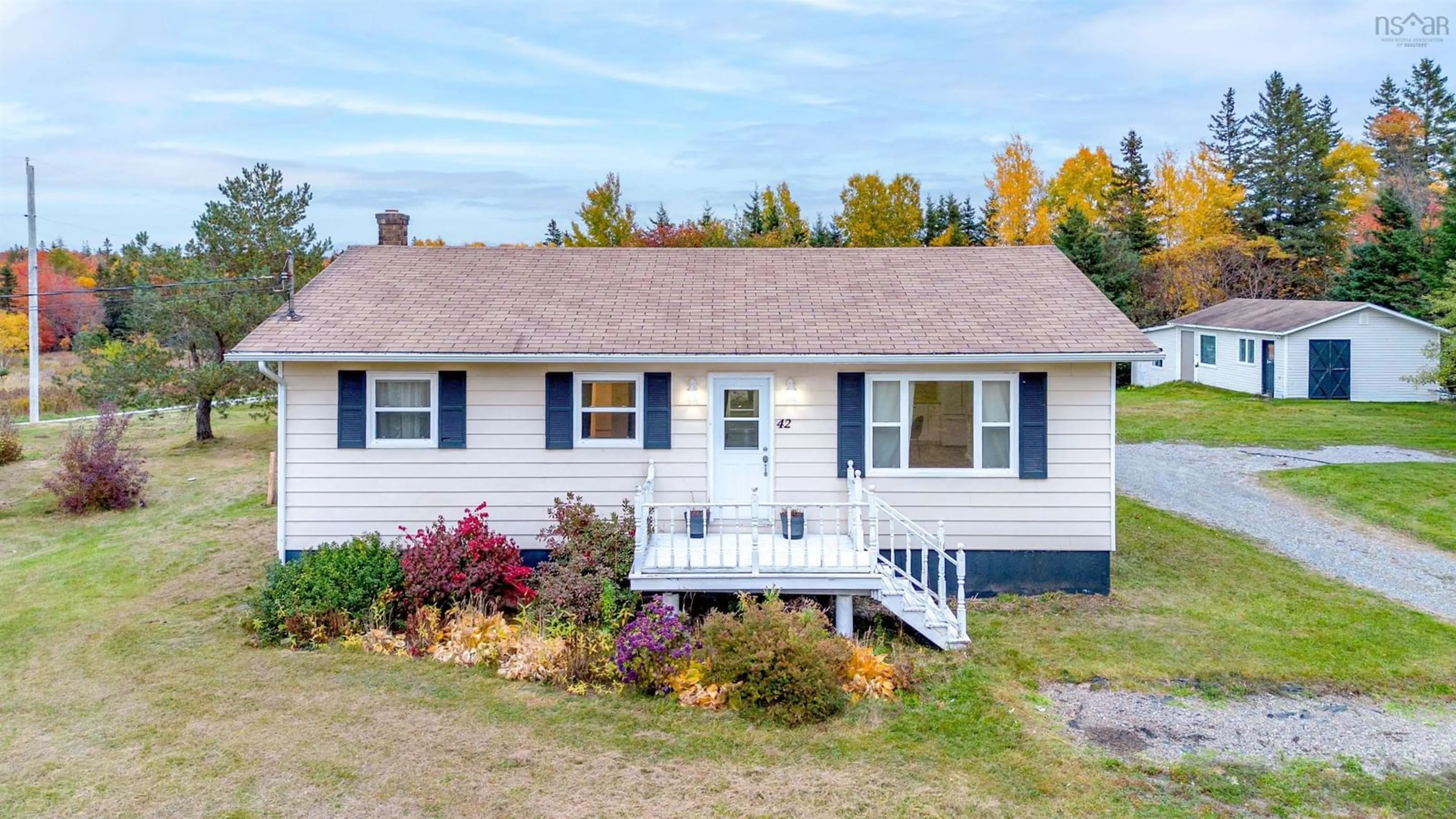 Home with vinyl exterior material, street for 42 King Grove Rd, Millville Nova Scotia B1Y 2B9