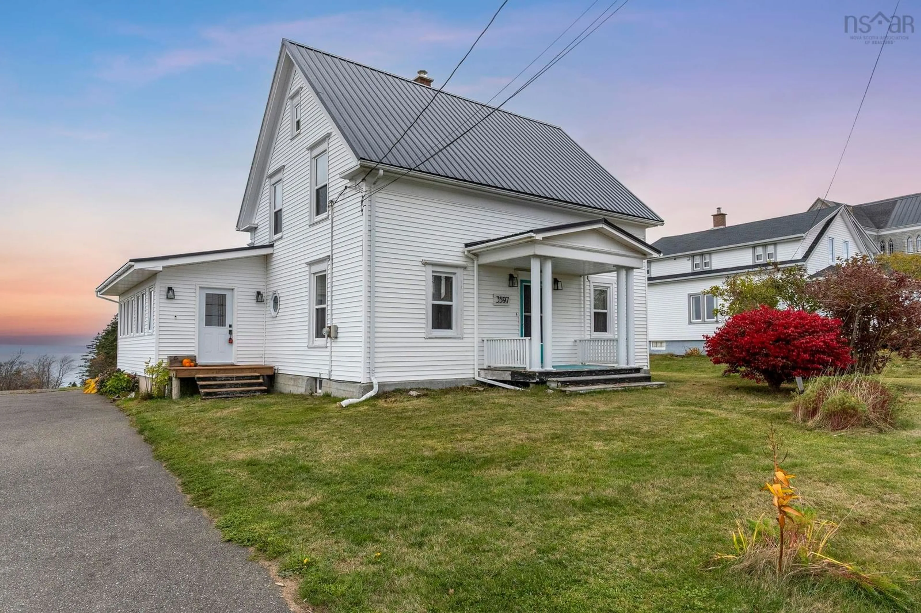 Home with vinyl exterior material, street for 3597 Highway 1, St. Bernard Nova Scotia B0W 3T0