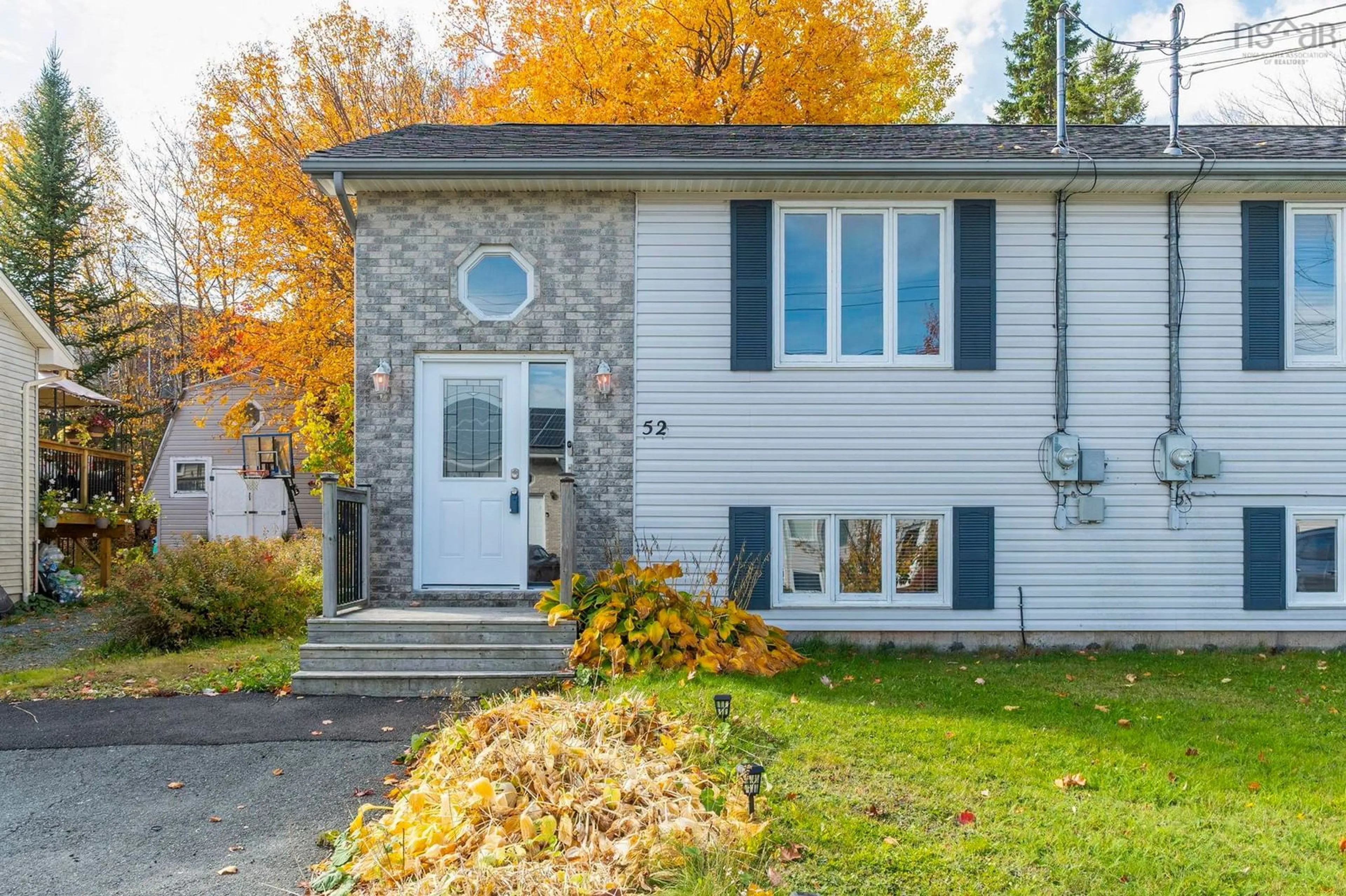 Home with vinyl exterior material, street for 52 Haddad Dr, Middle Sackville Nova Scotia B4C 4A5