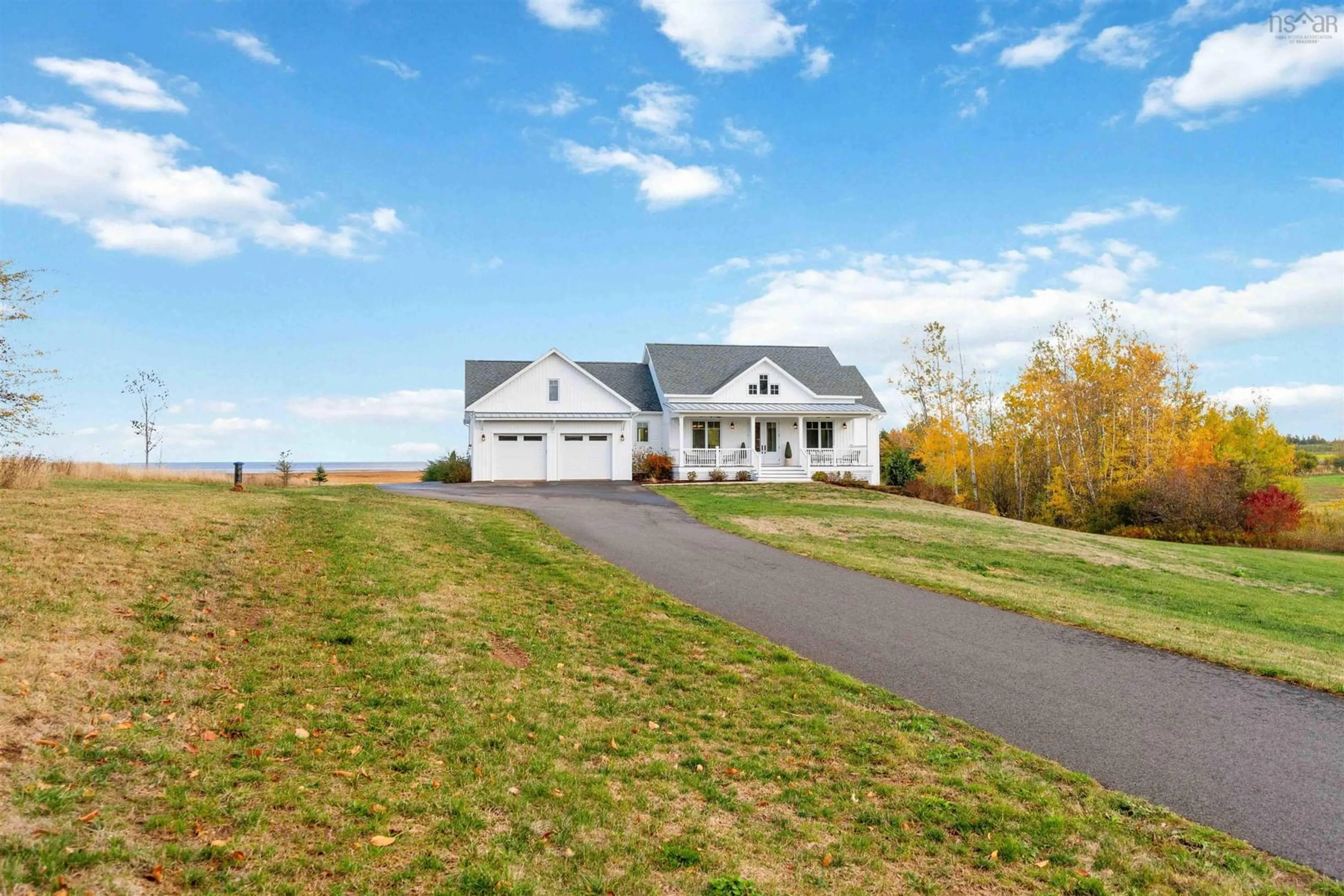A pic from outside/outdoor area/front of a property/back of a property/a pic from drone, water/lake/river/ocean view for 70 Wellington Dyke Rd, Port Williams Nova Scotia B0P 1T0