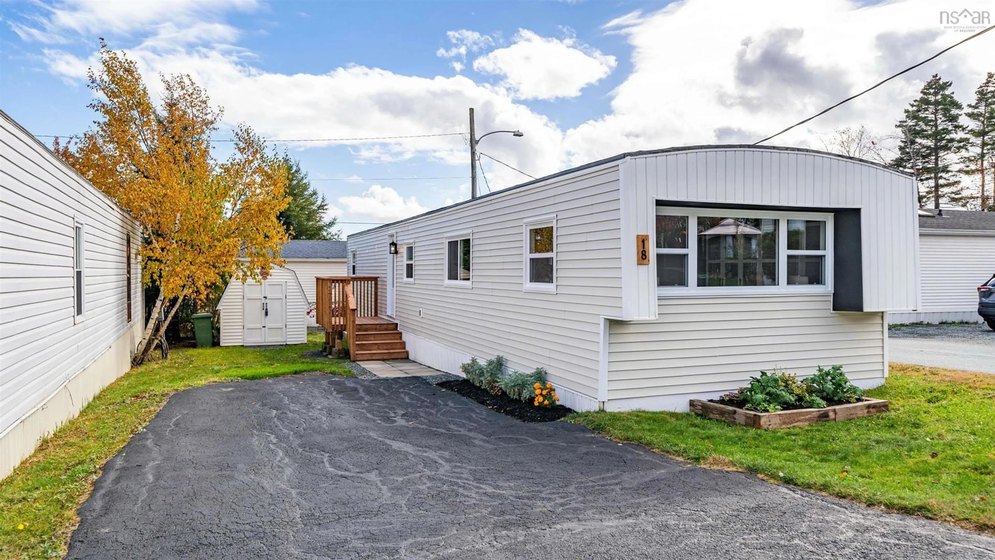 Home with vinyl exterior material, street for 18 Earleton Ave, Dartmouth Nova Scotia B2Y 2A7