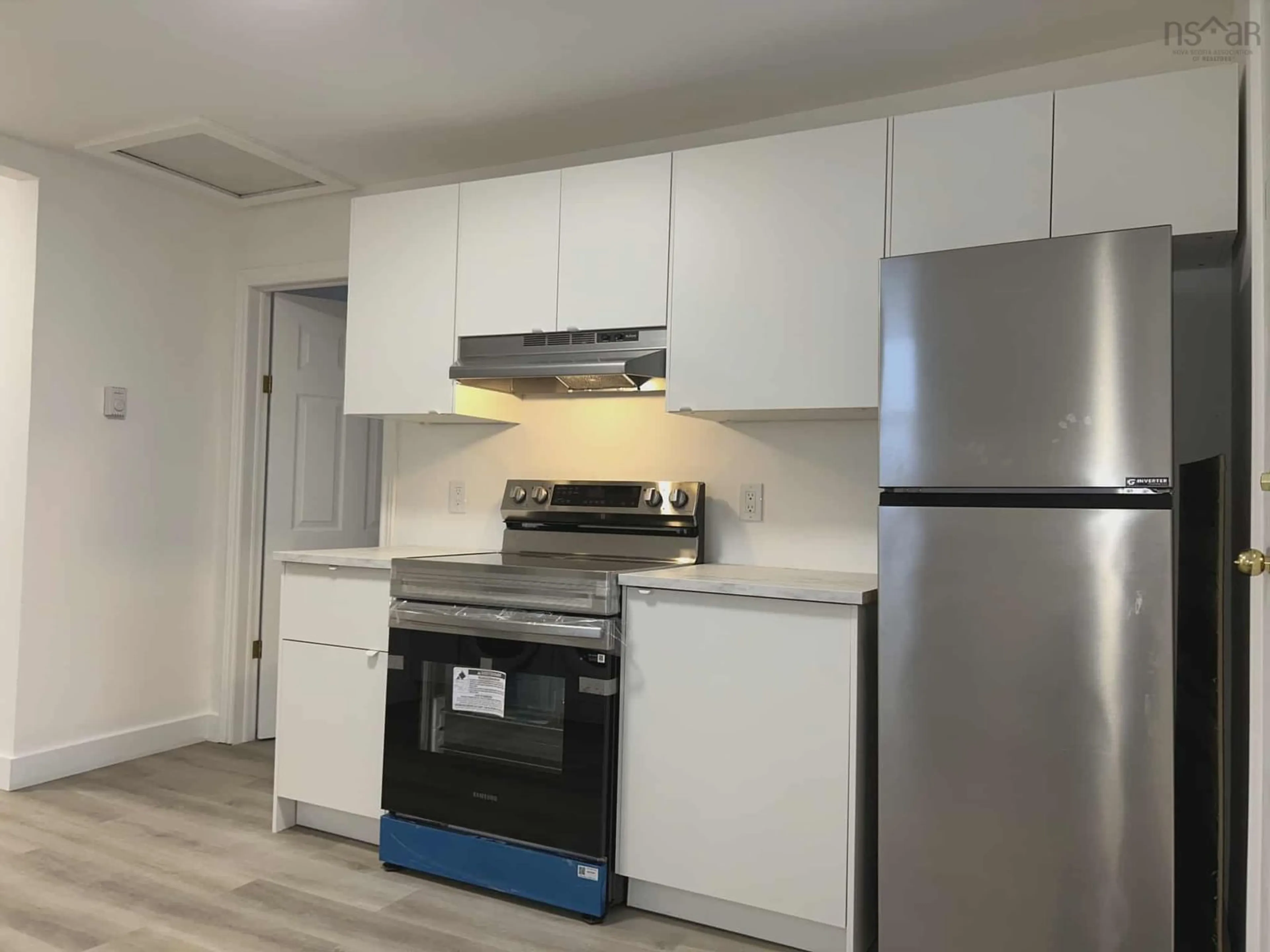 Standard kitchen, wood/laminate floor for 47 Coronation Ave, Fairview Nova Scotia B3N 2M6