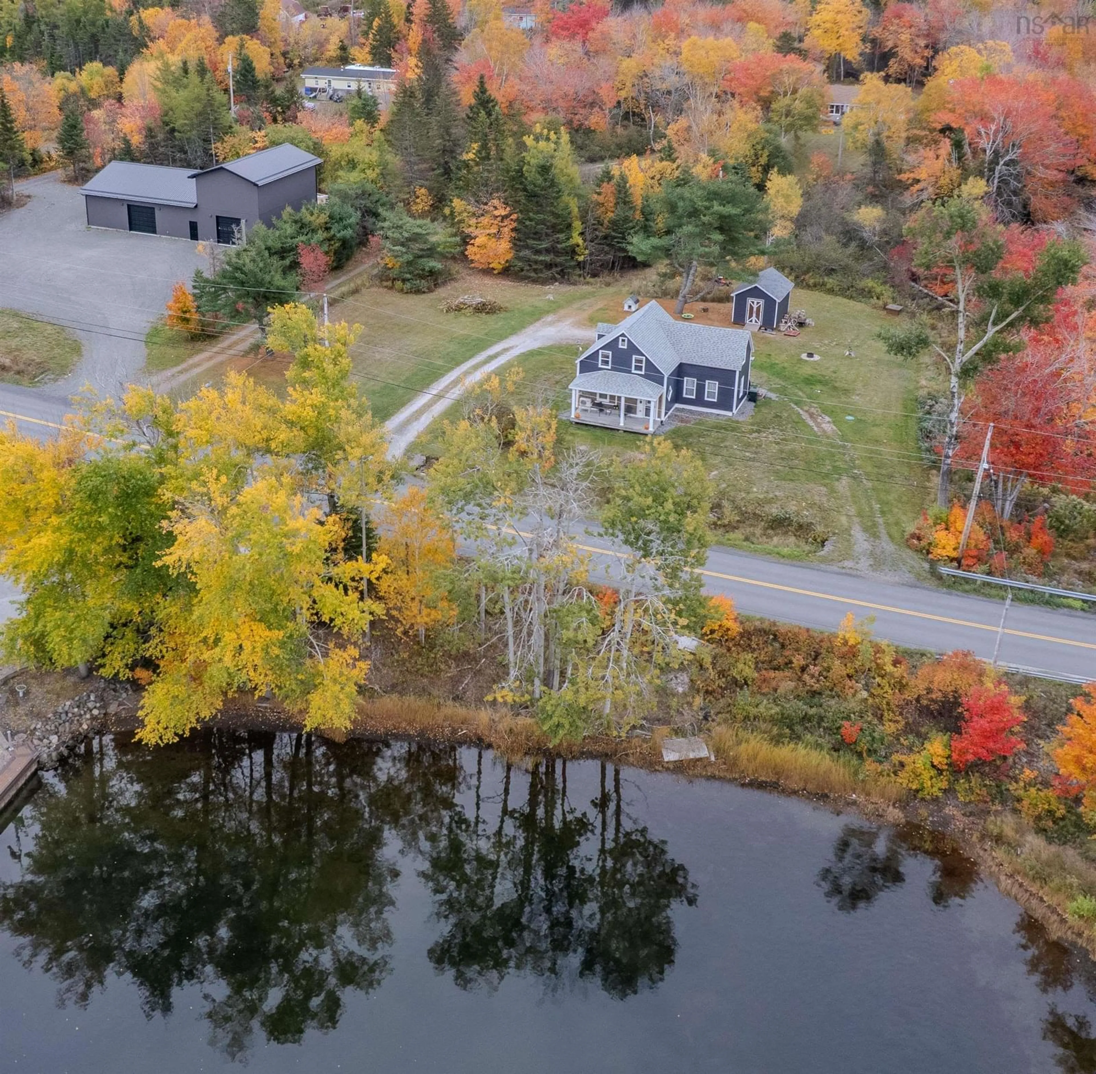 A pic from outside/outdoor area/front of a property/back of a property/a pic from drone, water/lake/river/ocean view for 328 Brickyard Rd, Cape Breton Nova Scotia B1K 2R7