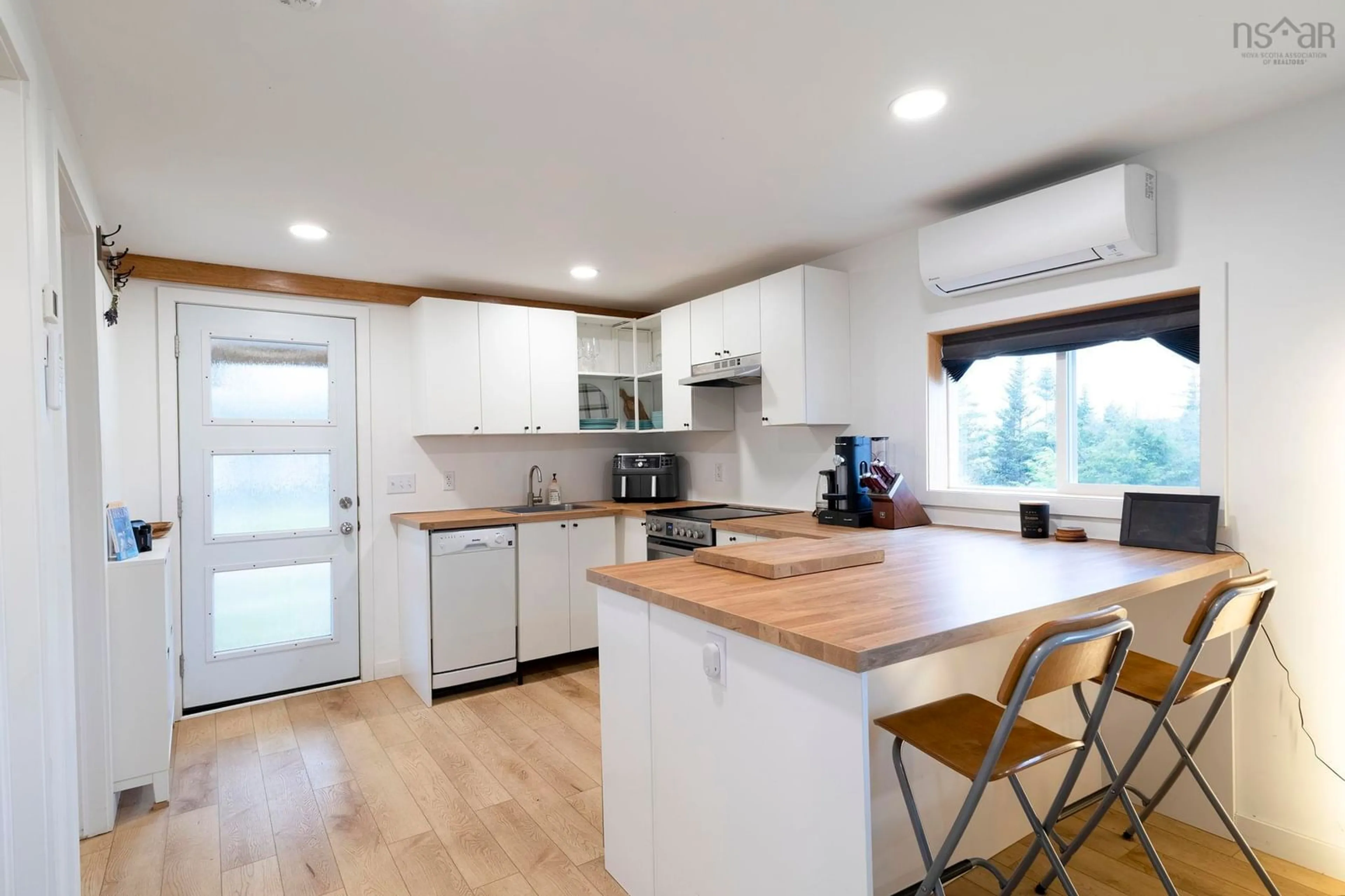 Open concept kitchen, wood/laminate floor for 211 New River Rd, Kemptown Nova Scotia B6L 2K8