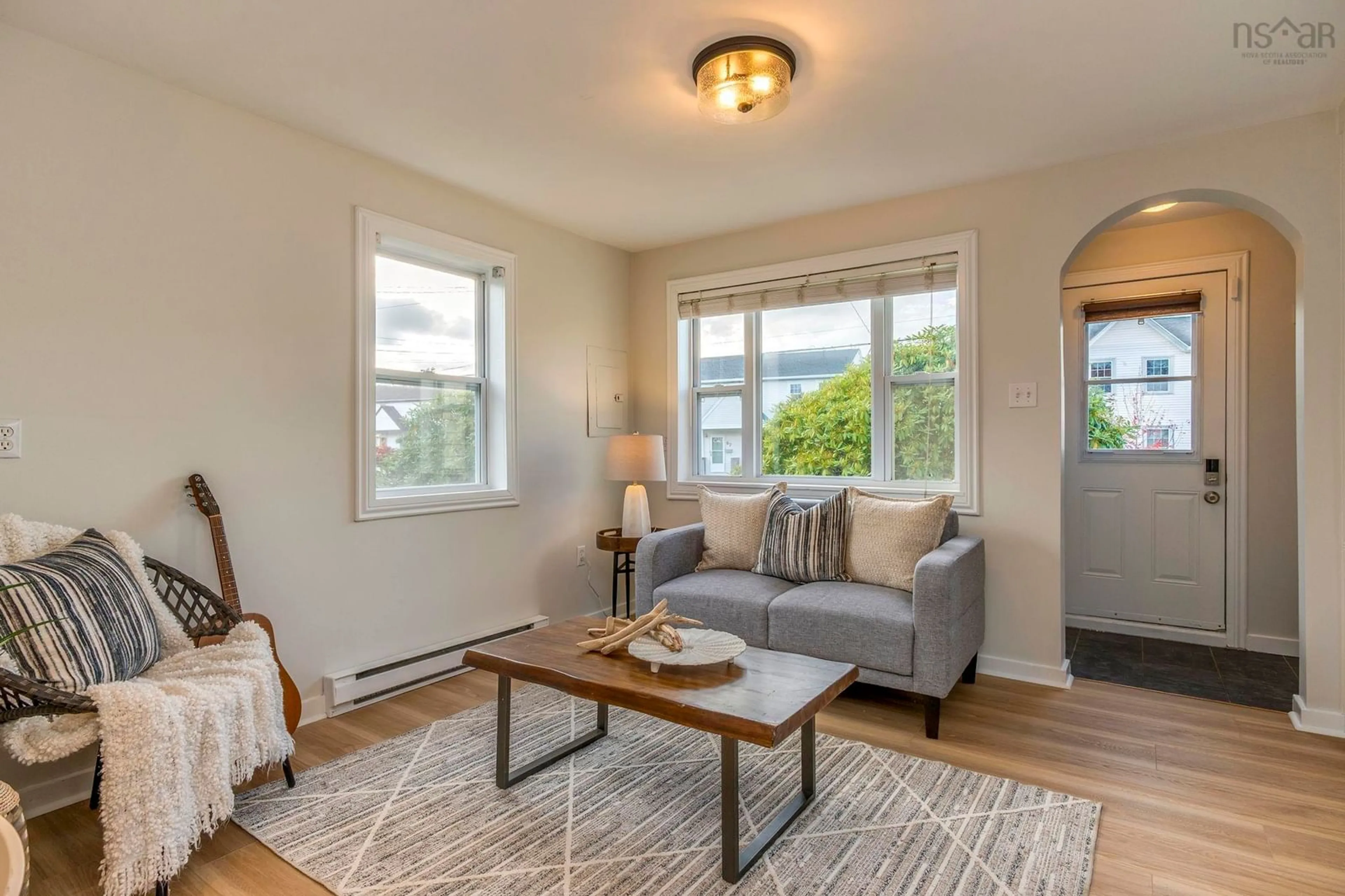 Living room with furniture, wood/laminate floor for 92 Withrod Dr, Halifax Nova Scotia B3N 1B7