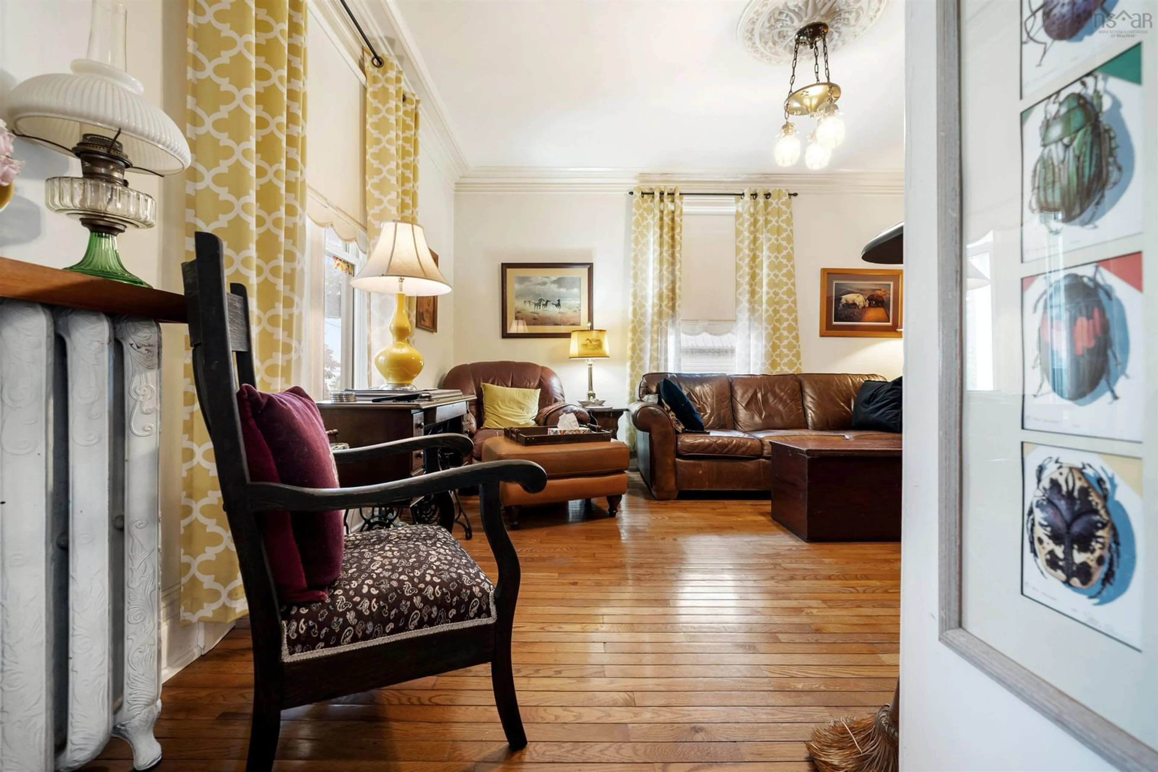 Living room with furniture, wood/laminate floor for 15 Prince St, Pictou Nova Scotia B0K 1H0