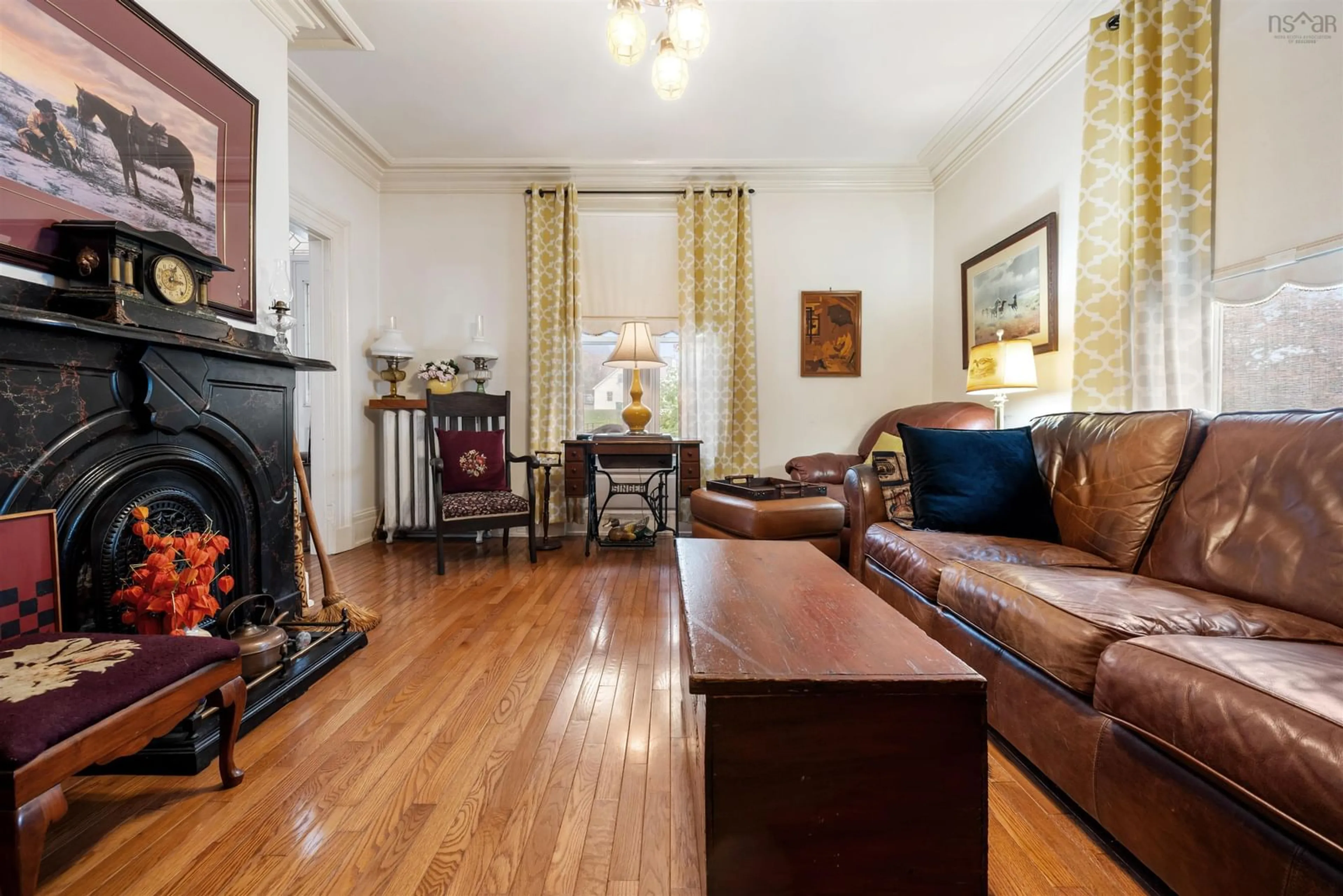 Living room with furniture, wood/laminate floor for 15 Prince St, Pictou Nova Scotia B0K 1H0