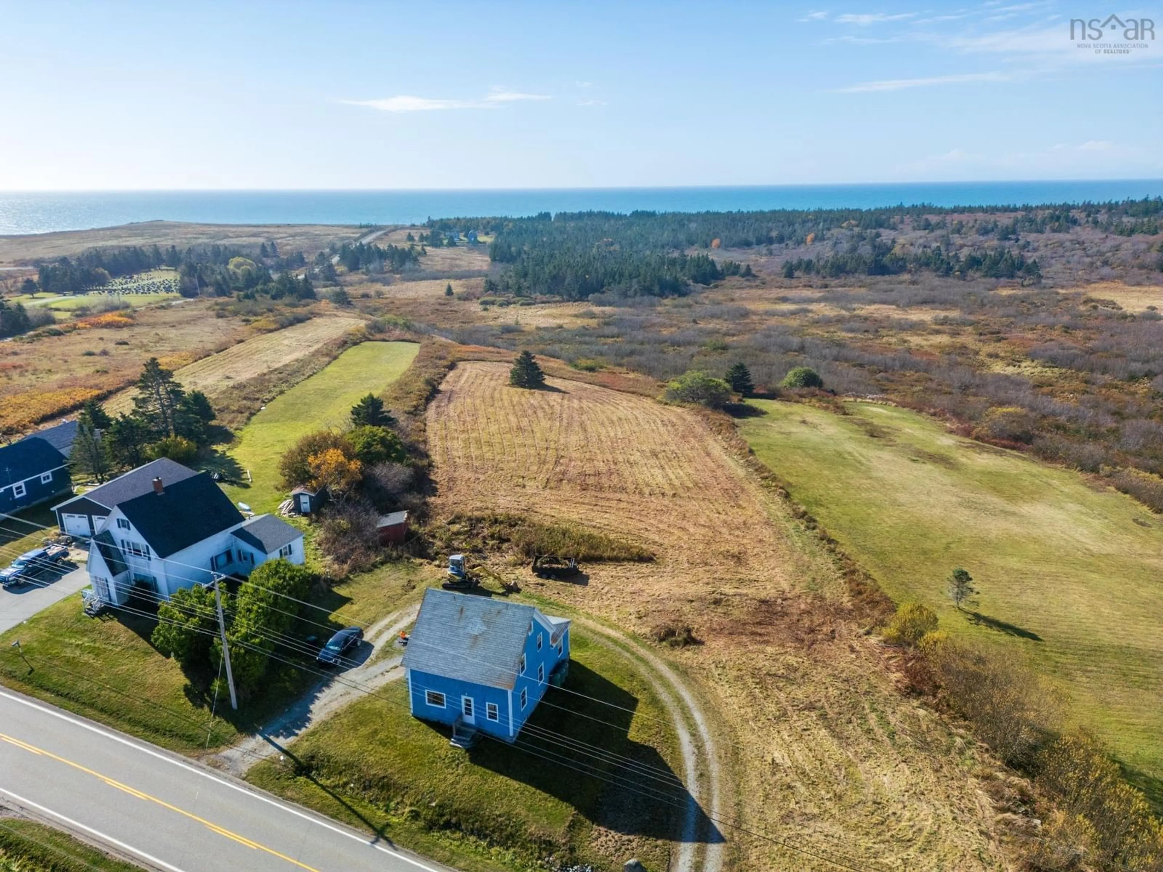 A pic from outside/outdoor area/front of a property/back of a property/a pic from drone, water/lake/river/ocean view for 5241 Highway 1, Salmon River Nova Scotia B5A 5B2
