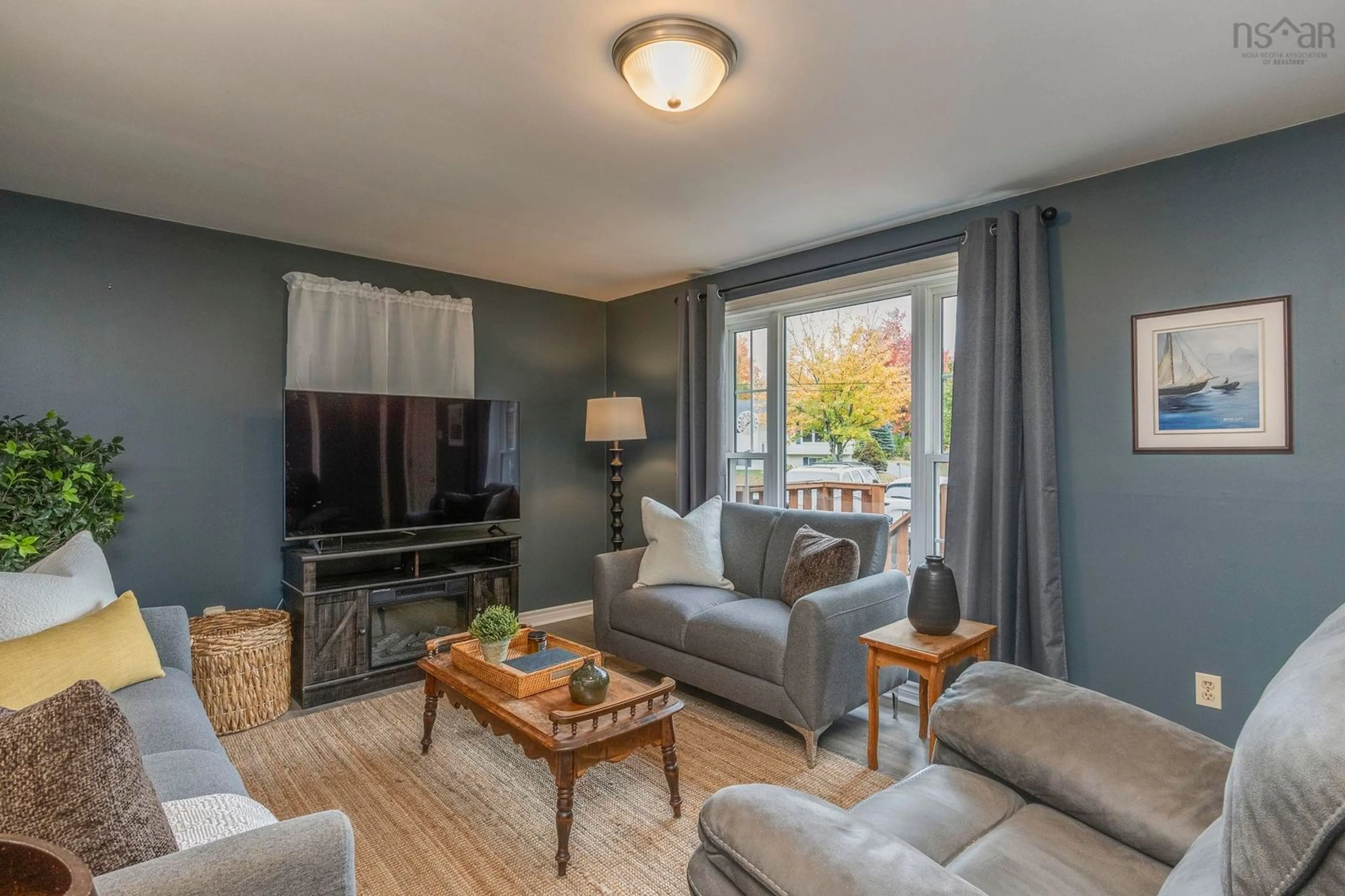 Living room with furniture, unknown for 1003 Lydiard Rd, Centreville Nova Scotia B0P 1J0