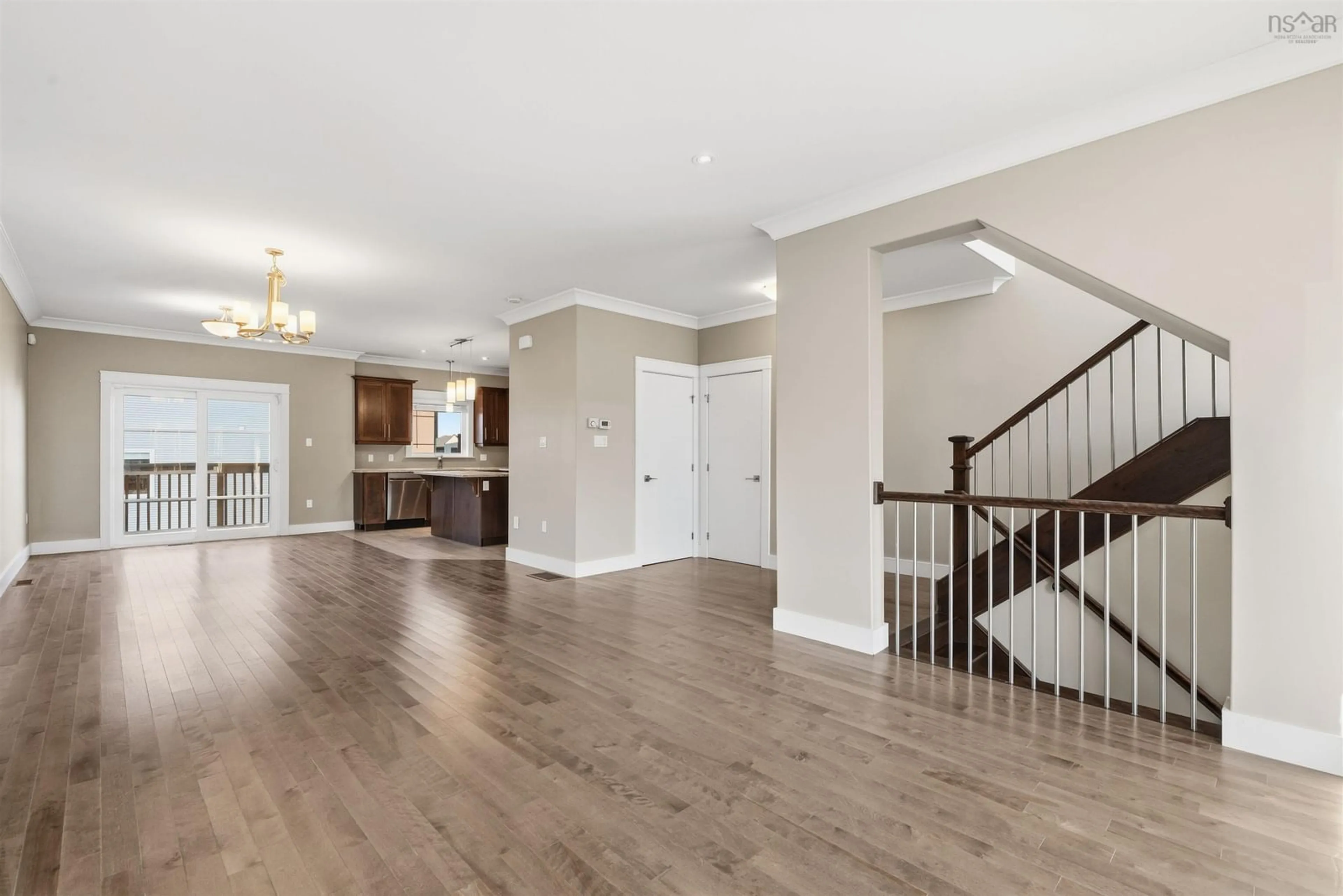 Open concept kitchen, wood/laminate floor for 26 Eliza Ritchie Cres, Halifax Nova Scotia B3M 1Y1