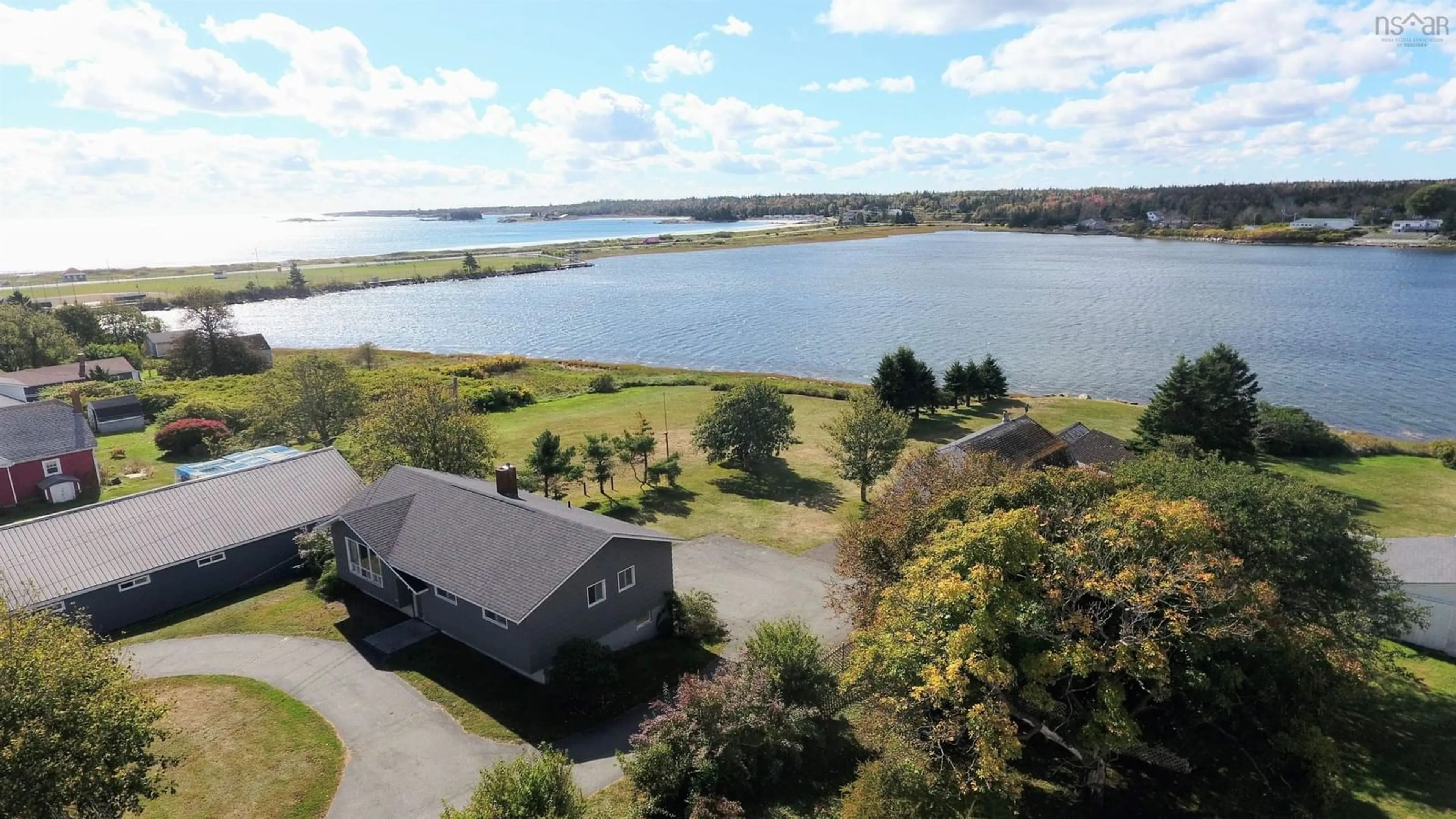 A pic from outside/outdoor area/front of a property/back of a property/a pic from drone, water/lake/river/ocean view for 41 Howe St, Lockeport Nova Scotia B0T 1L0