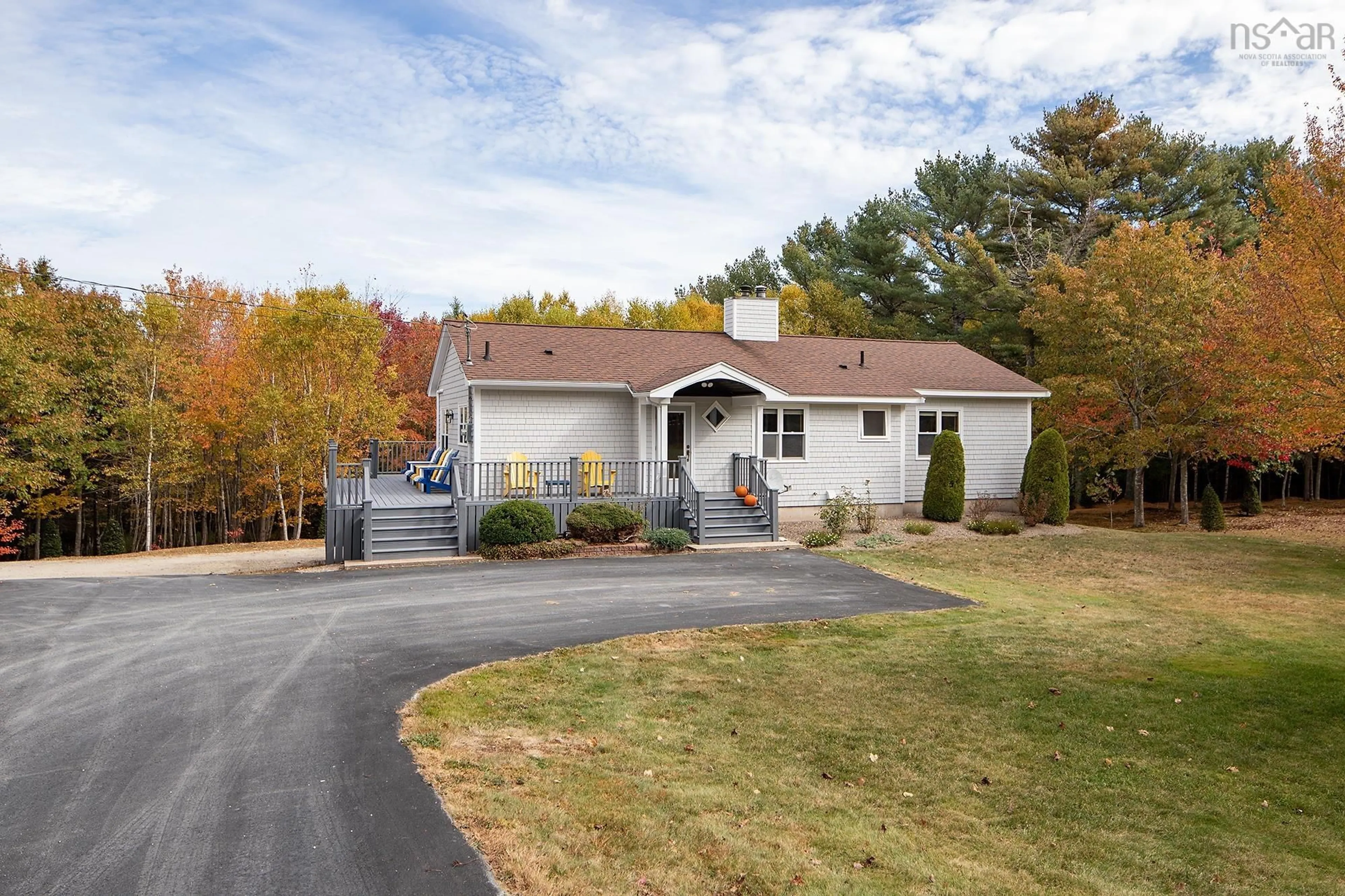 Home with vinyl exterior material, street for 26 Rocky Run, Marriotts Cove Nova Scotia B0J 1K0
