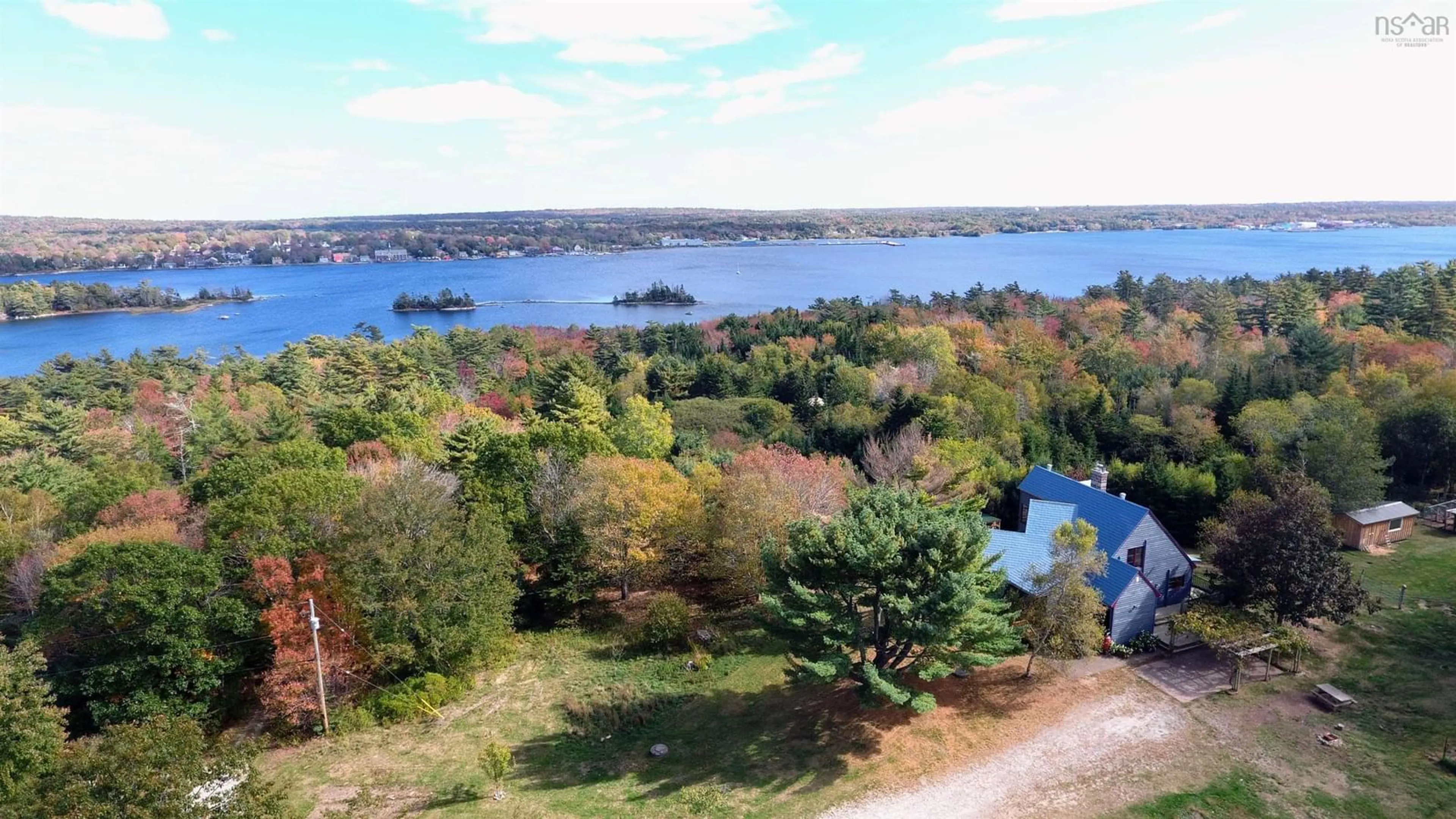 A pic from outside/outdoor area/front of a property/back of a property/a pic from drone, water/lake/river/ocean view for 192 Barracks Cove Rd, Reids Hill Nova Scotia B0T 1W0