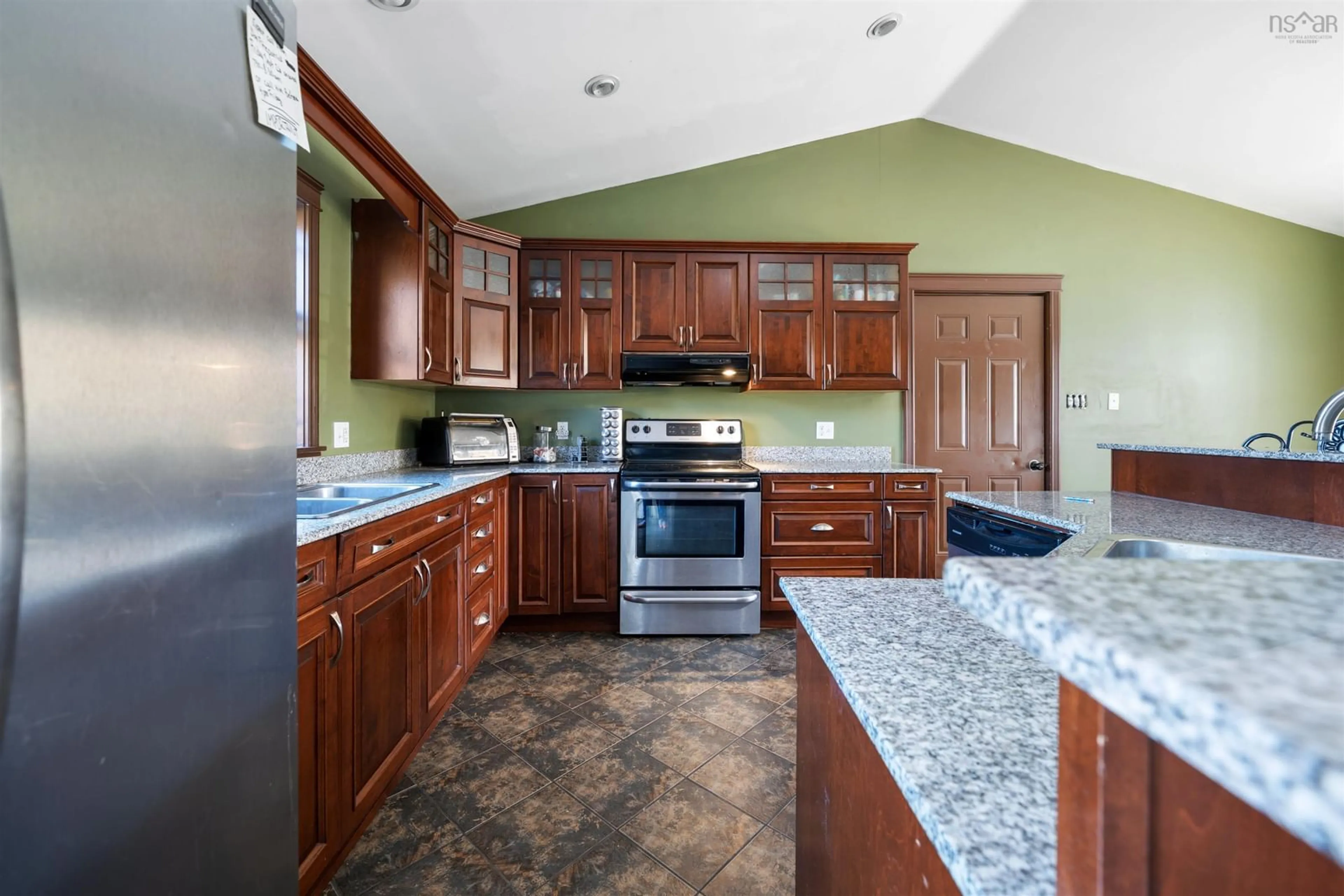 Open concept kitchen, ceramic/tile floor for 87 New Row, Thorburn Nova Scotia B0K 1W0