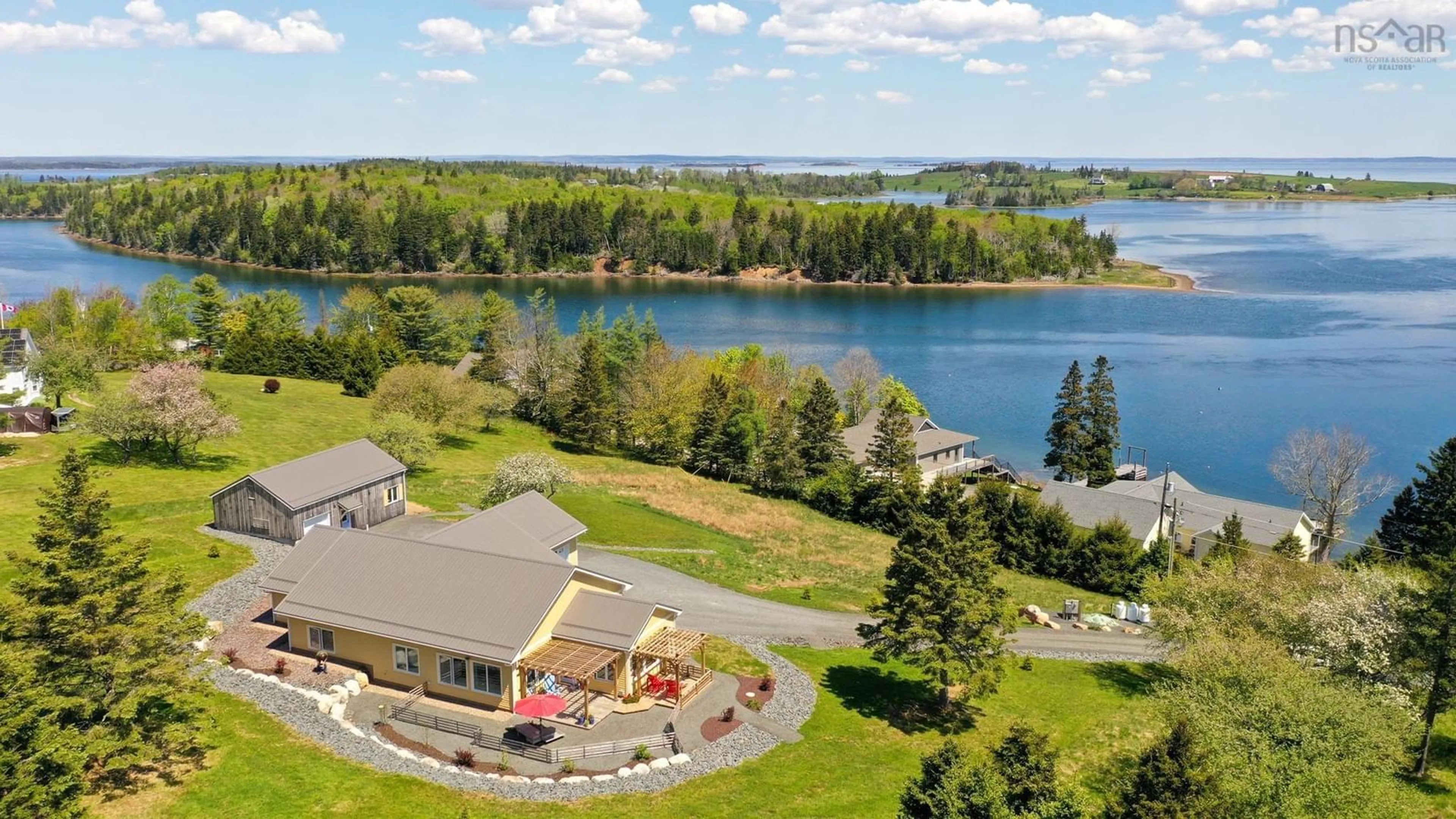 A pic from outside/outdoor area/front of a property/back of a property/a pic from drone, water/lake/river/ocean view for 207 Hebb Point Rd, Heckmans Island Nova Scotia B0J 2C0