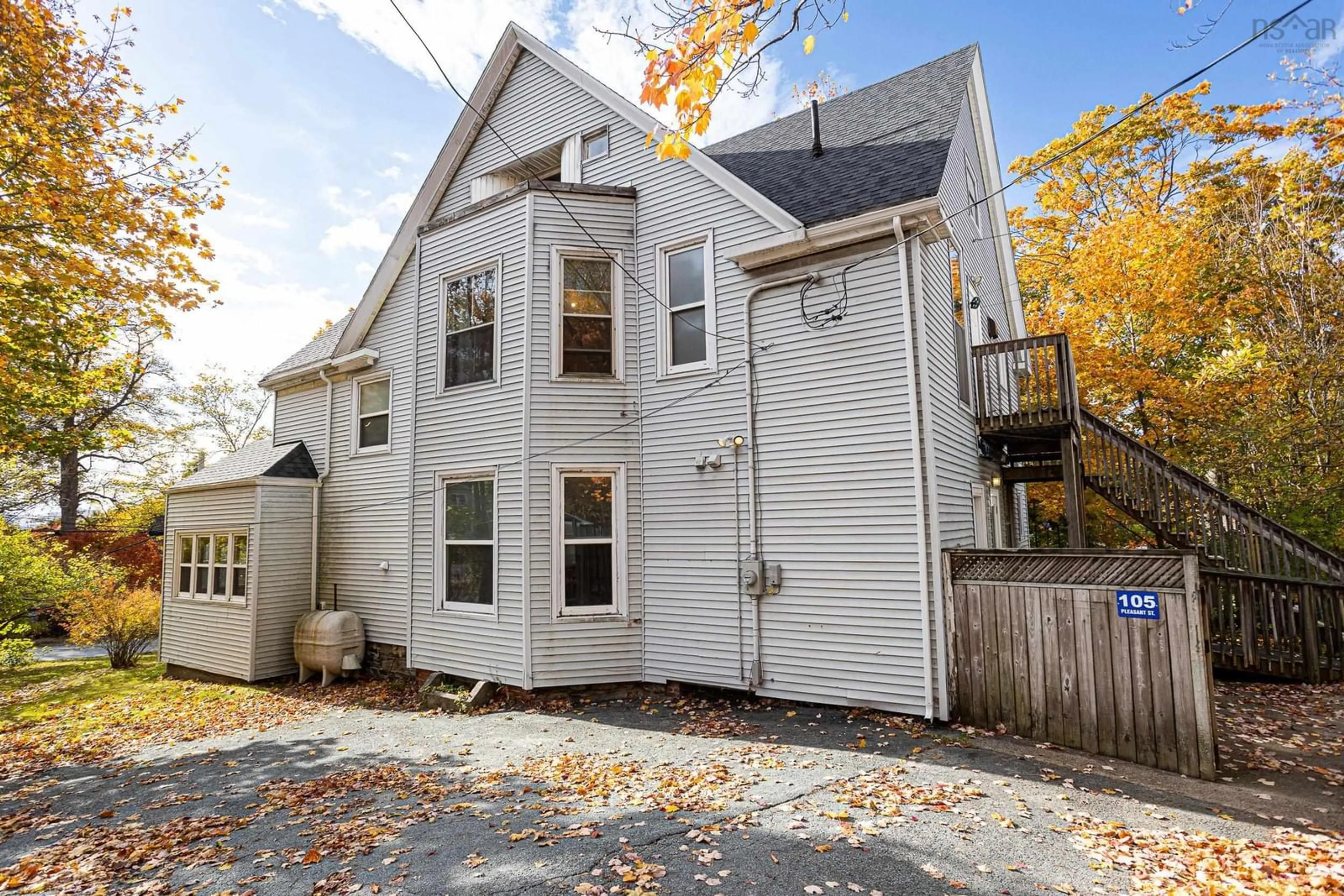 Home with vinyl exterior material, street for 105 Pleasant St, Dartmouth Nova Scotia B2Y 3P7