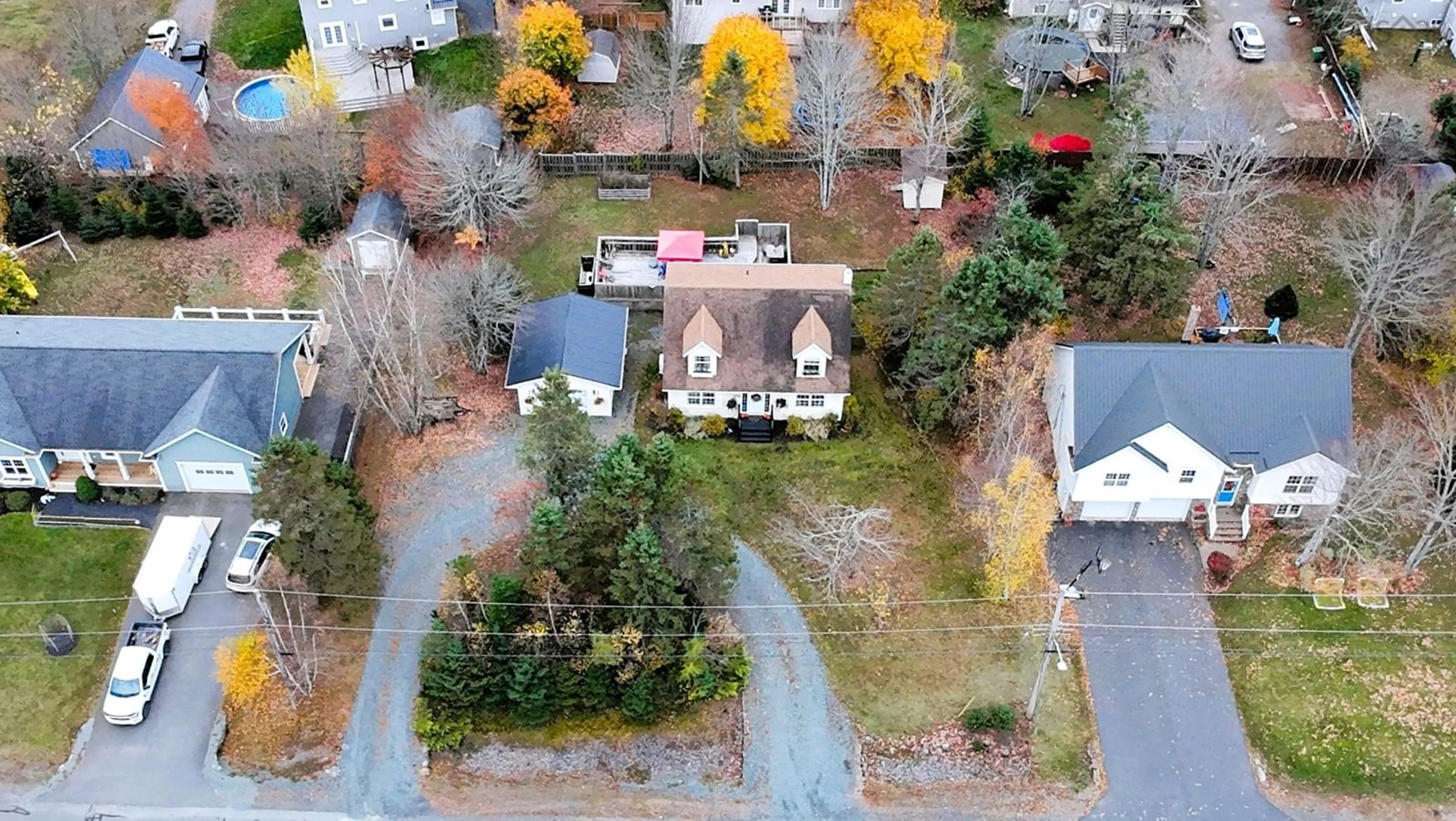 A pic from outside/outdoor area/front of a property/back of a property/a pic from drone, street for 54 Eaton Dr, Valley Nova Scotia B6L 3J9
