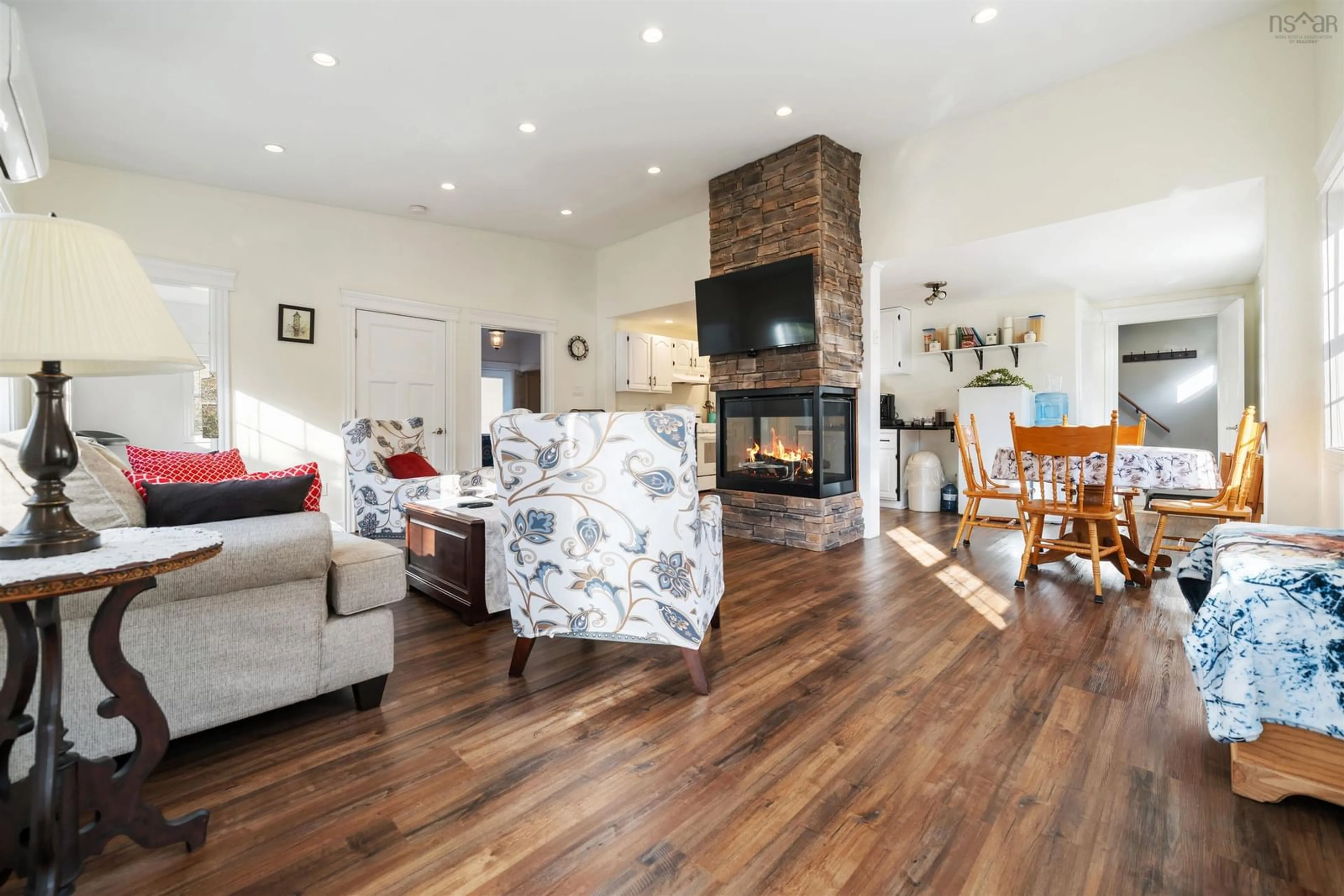 Living room with furniture, wood/laminate floor for 208 Pleasant St, Truro Nova Scotia B2N 3S8