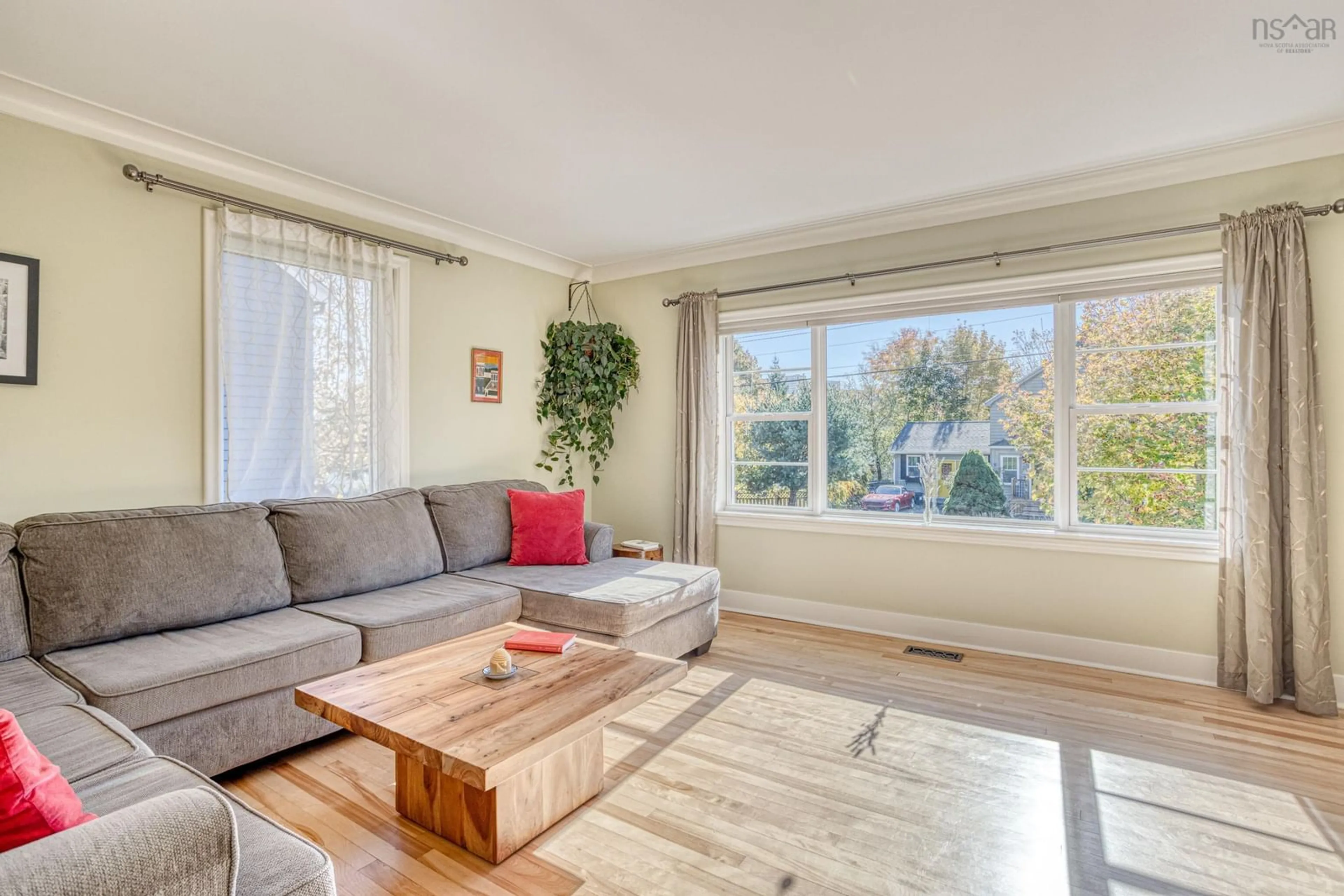 Living room with furniture, wood/laminate floor for 21 Lawnwood Ave, Halifax Nova Scotia B3N 1E6