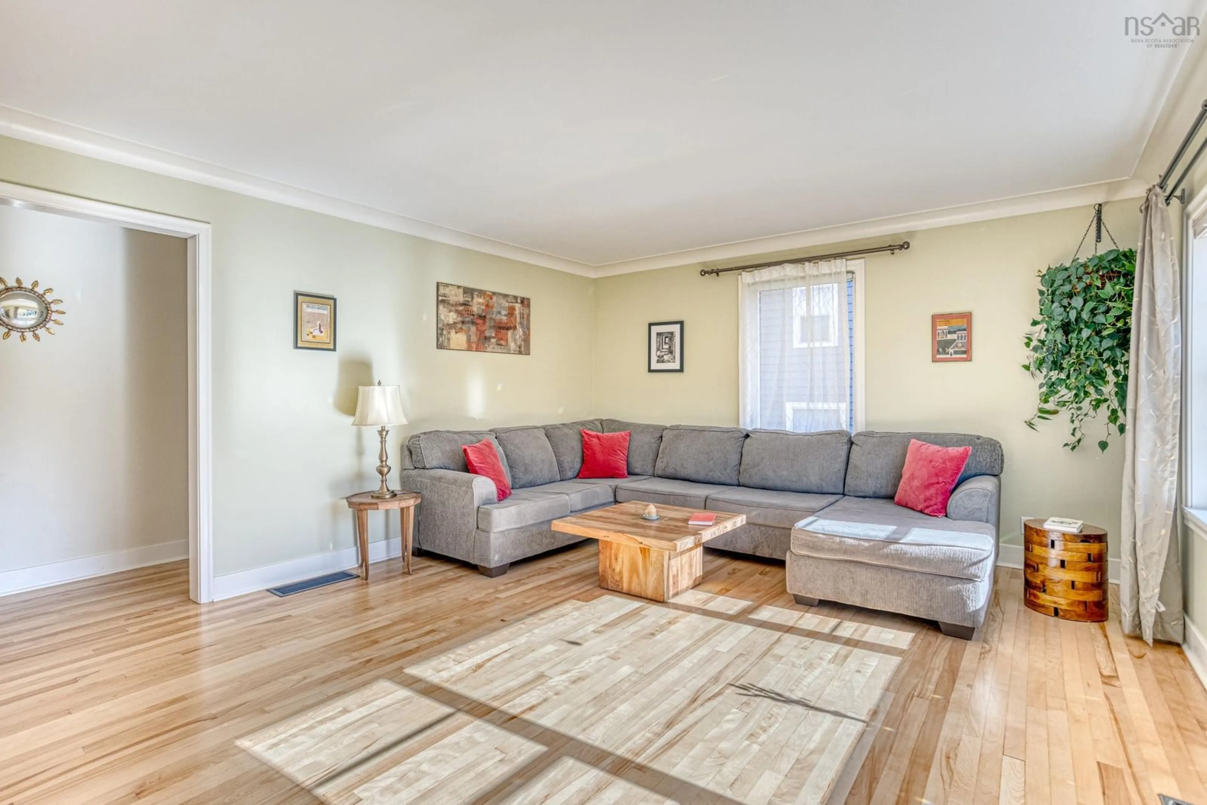 Living room with furniture, wood/laminate floor for 21 Lawnwood Ave, Halifax Nova Scotia B3N 1E6