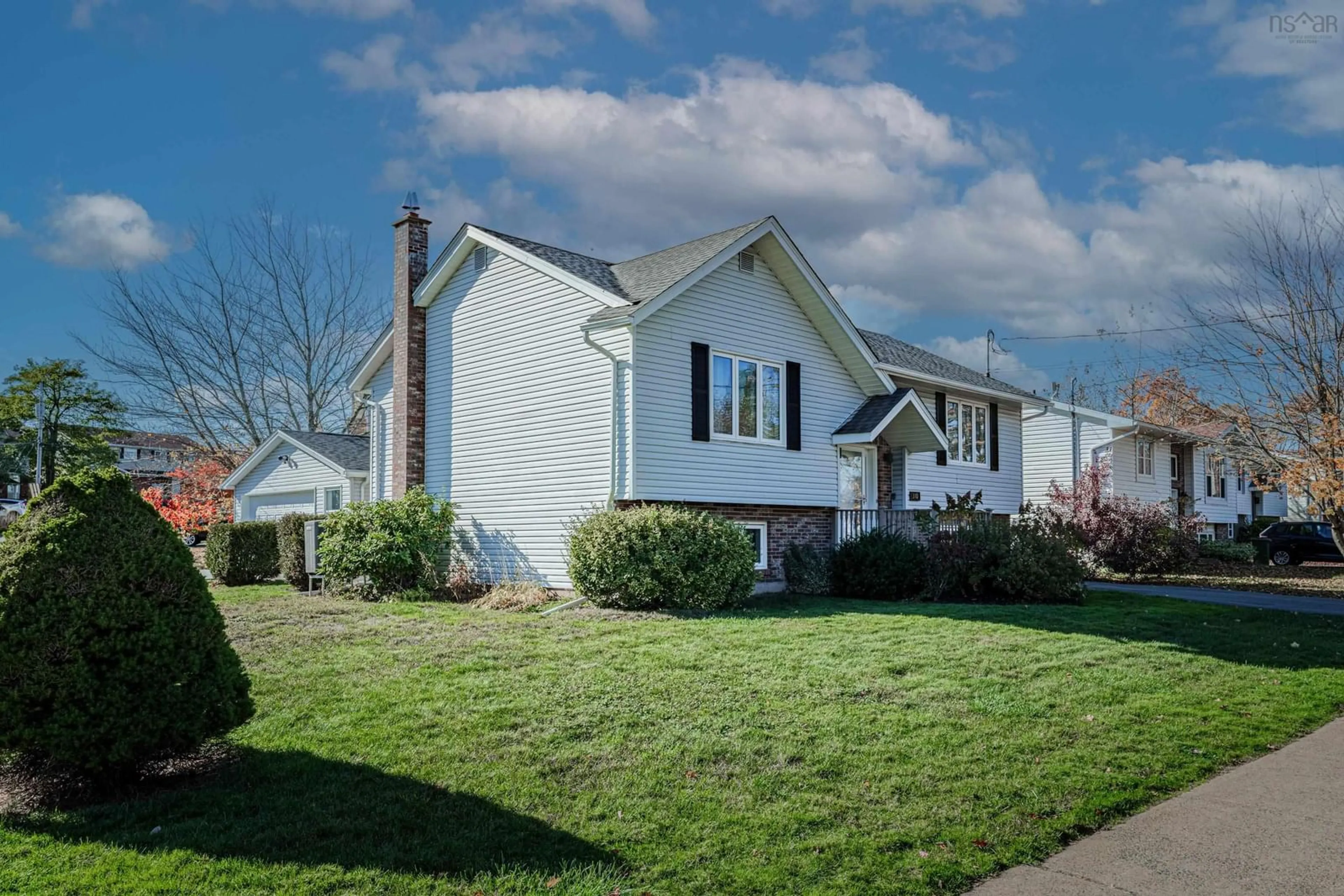 Home with vinyl exterior material, street for 310 John Stewart Dr, Cole Harbour Nova Scotia B2W 5P3