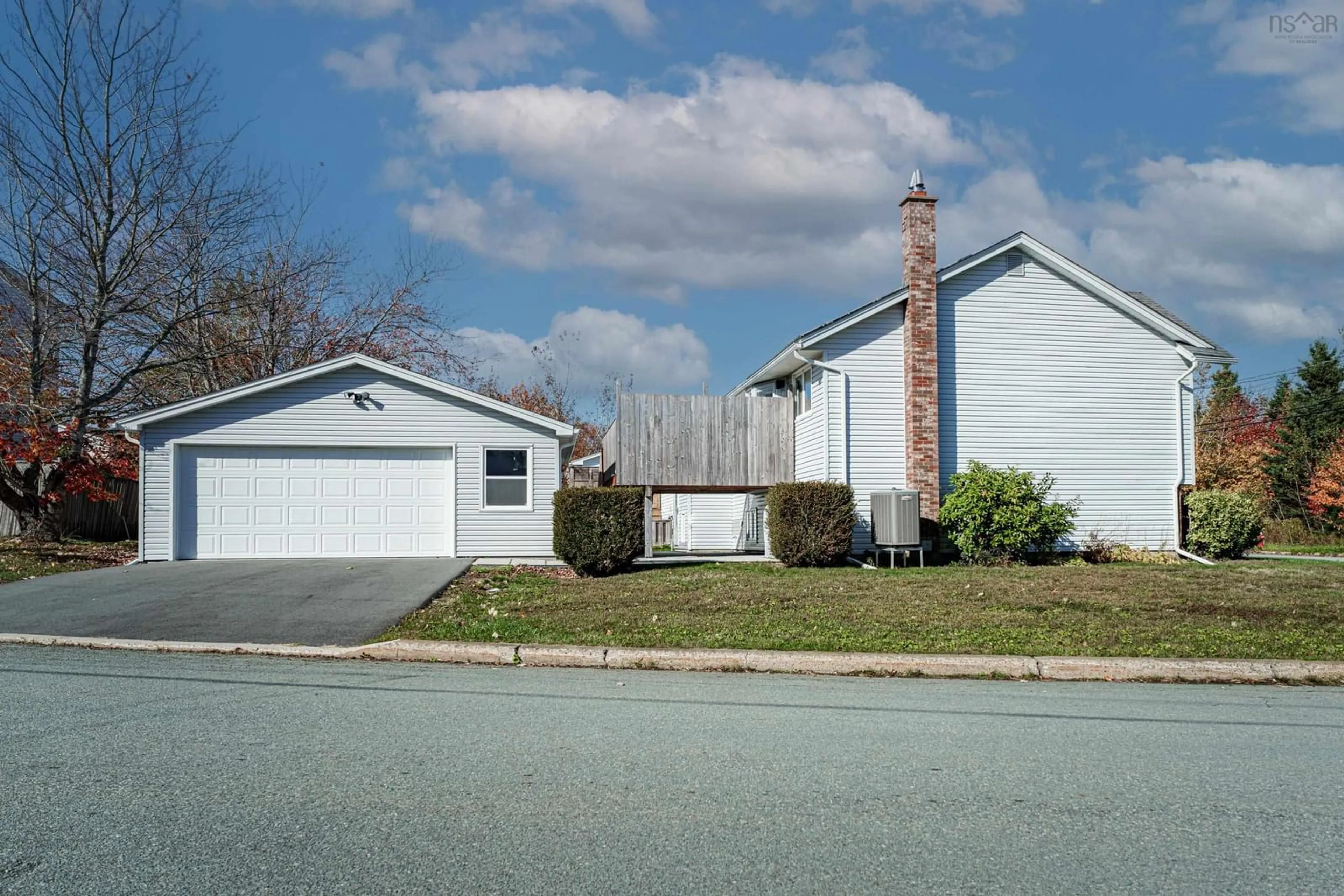 Home with vinyl exterior material, street for 310 John Stewart Dr, Cole Harbour Nova Scotia B2W 5P3