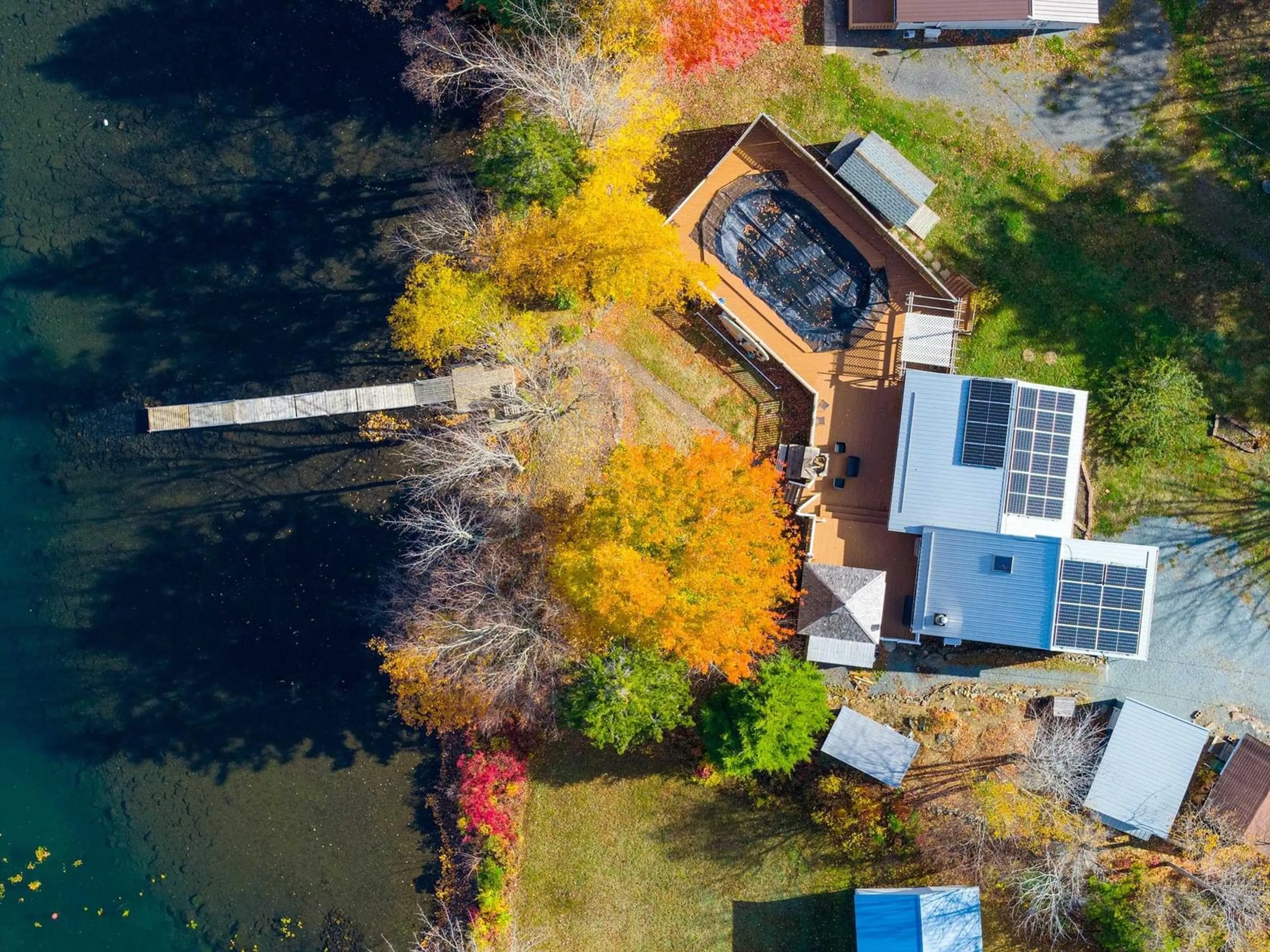 A pic from outside/outdoor area/front of a property/back of a property/a pic from drone, water/lake/river/ocean view for 27 Crooked Lake Rd, Camperdown Nova Scotia B4V 6T3