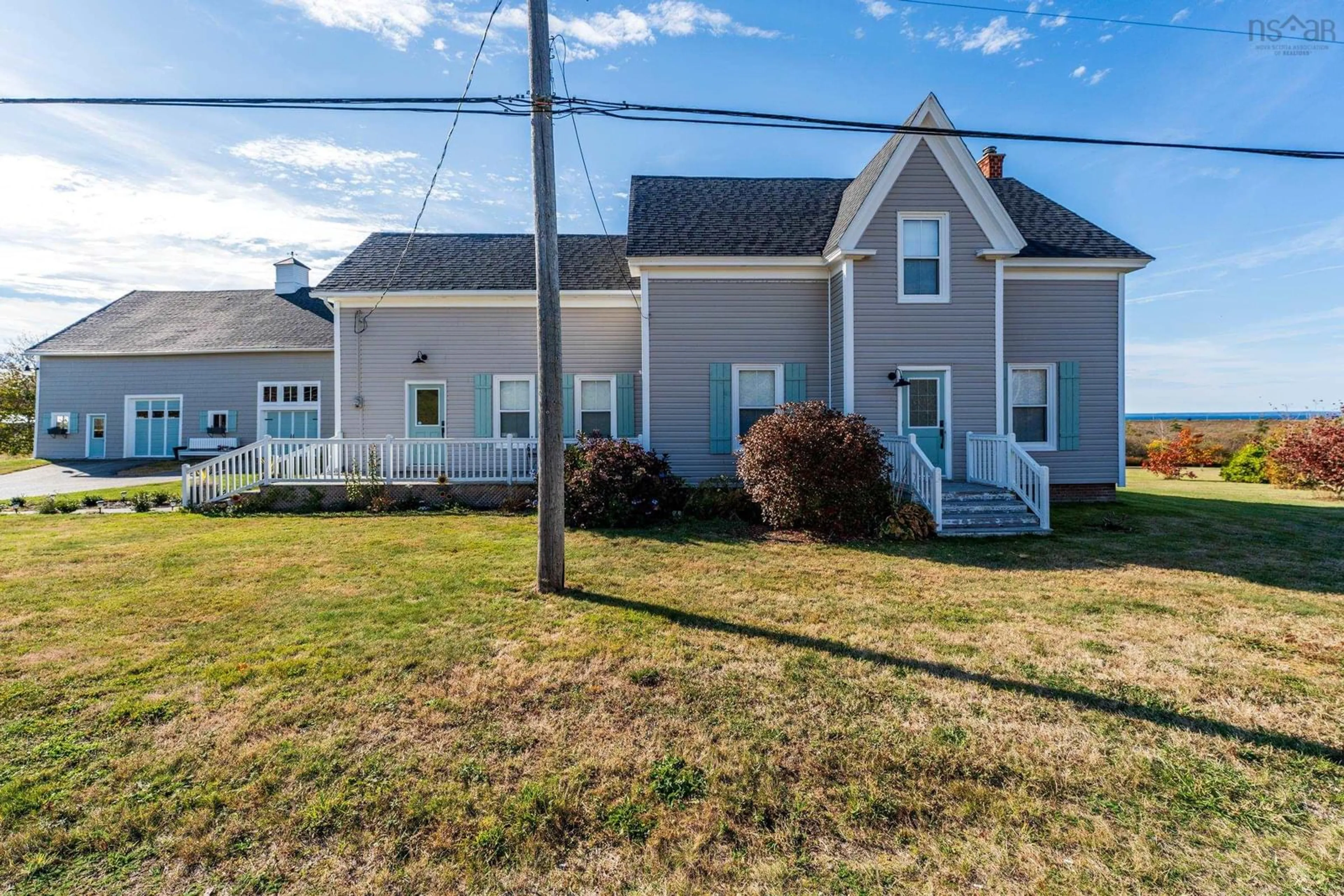 Home with vinyl exterior material, street for 8793 Highway 1, Meteghan River Nova Scotia B0W 2K0