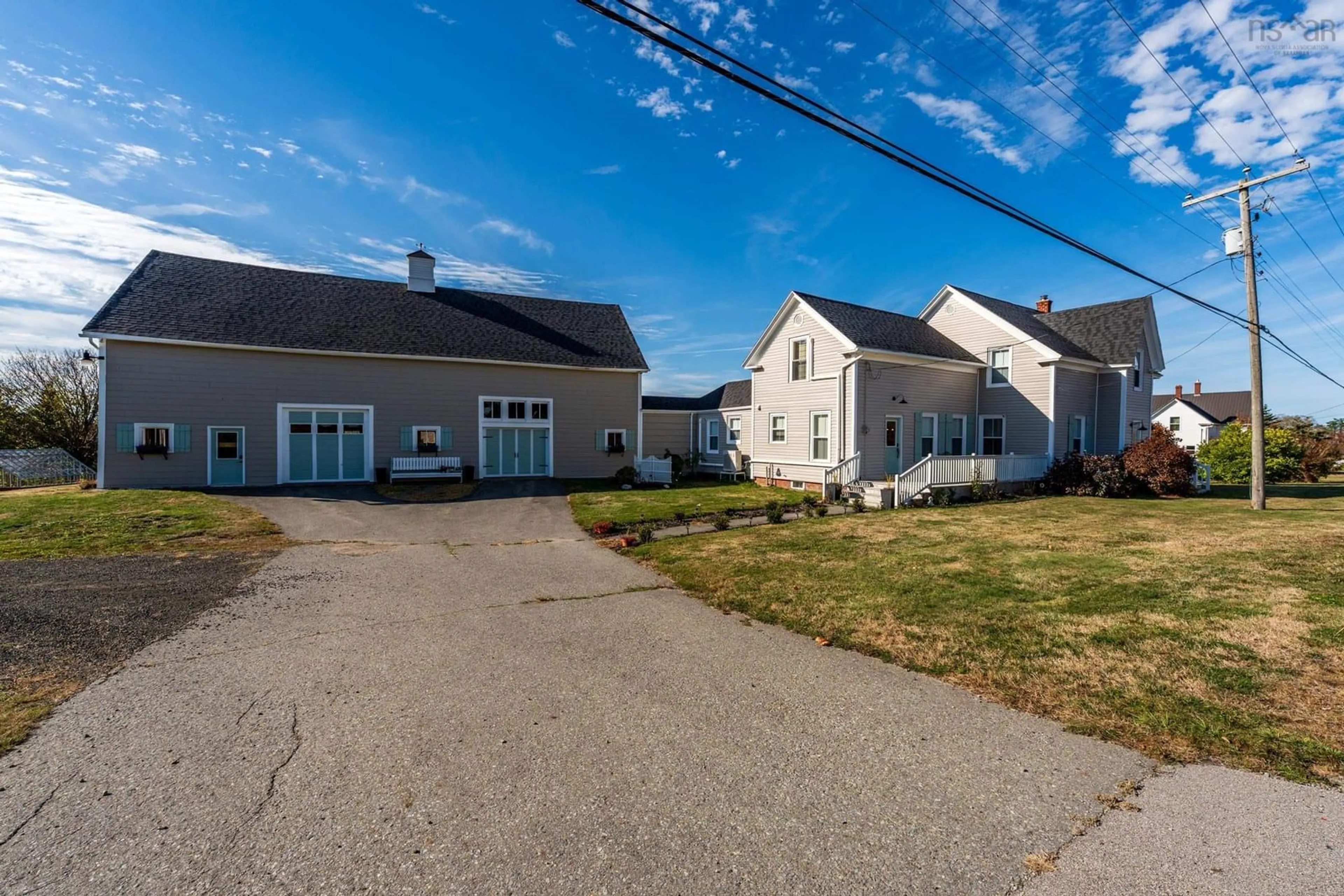 A pic from outside/outdoor area/front of a property/back of a property/a pic from drone, street for 8793 Highway 1, Meteghan River Nova Scotia B0W 2K0