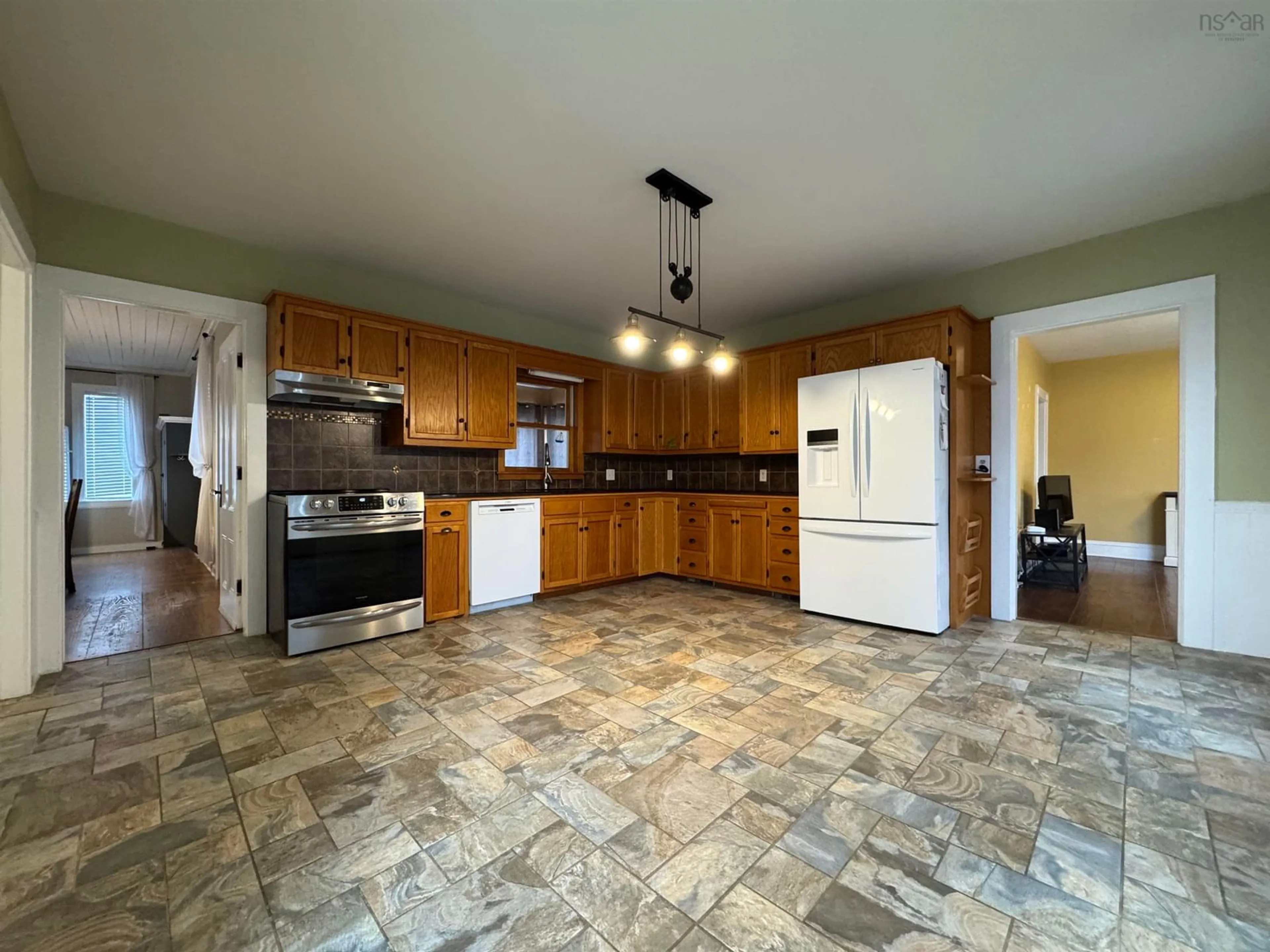 Open concept kitchen, ceramic/tile floor for 8793 Highway 1, Meteghan River Nova Scotia B0W 2K0
