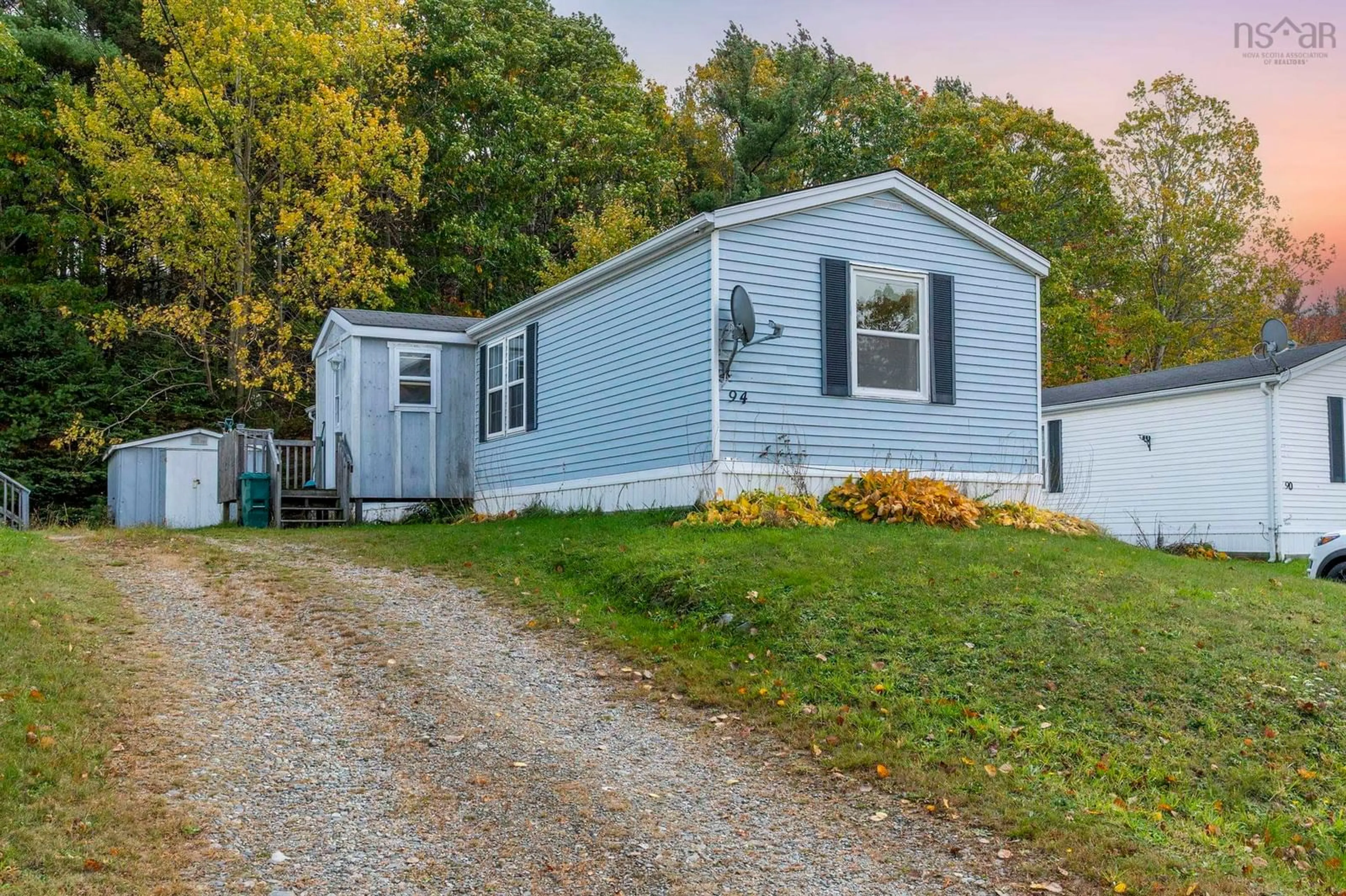 Home with vinyl exterior material, street for 94 Commission St, Sandy Point Nova Scotia B0T 1W0