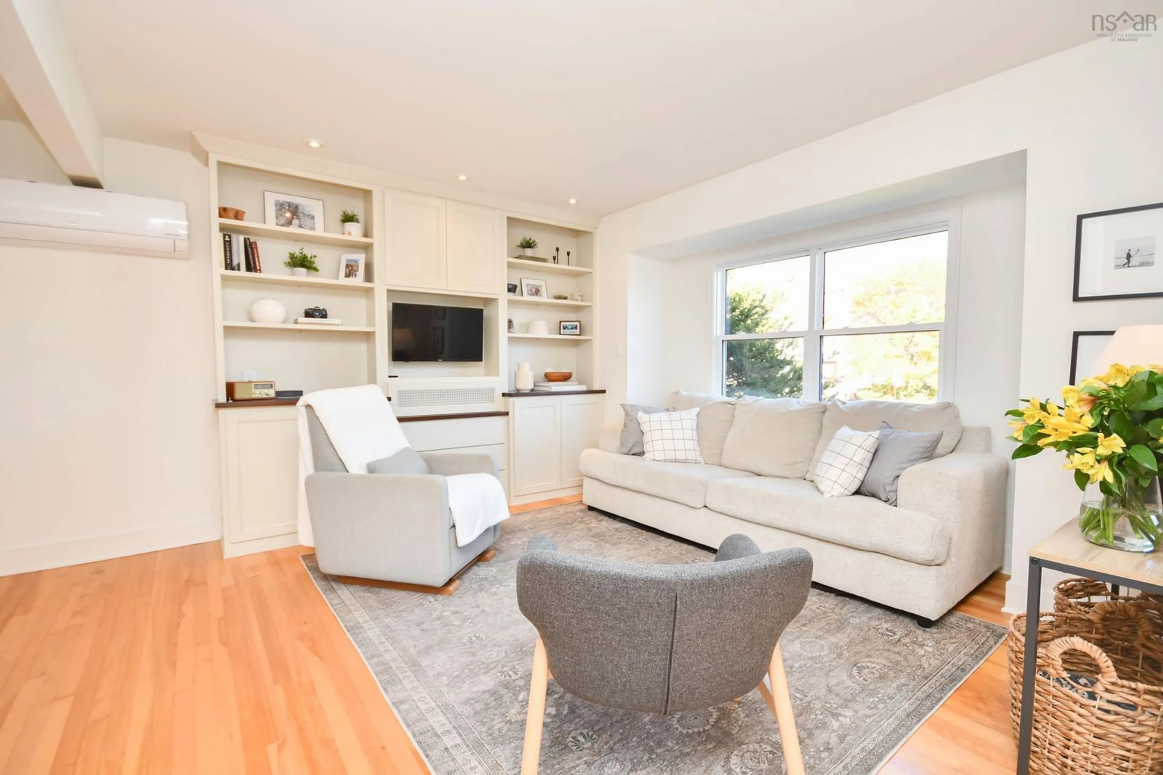 Living room with furniture, wood/laminate floor for 11 Walters St, Dartmouth Nova Scotia B2W 1S9