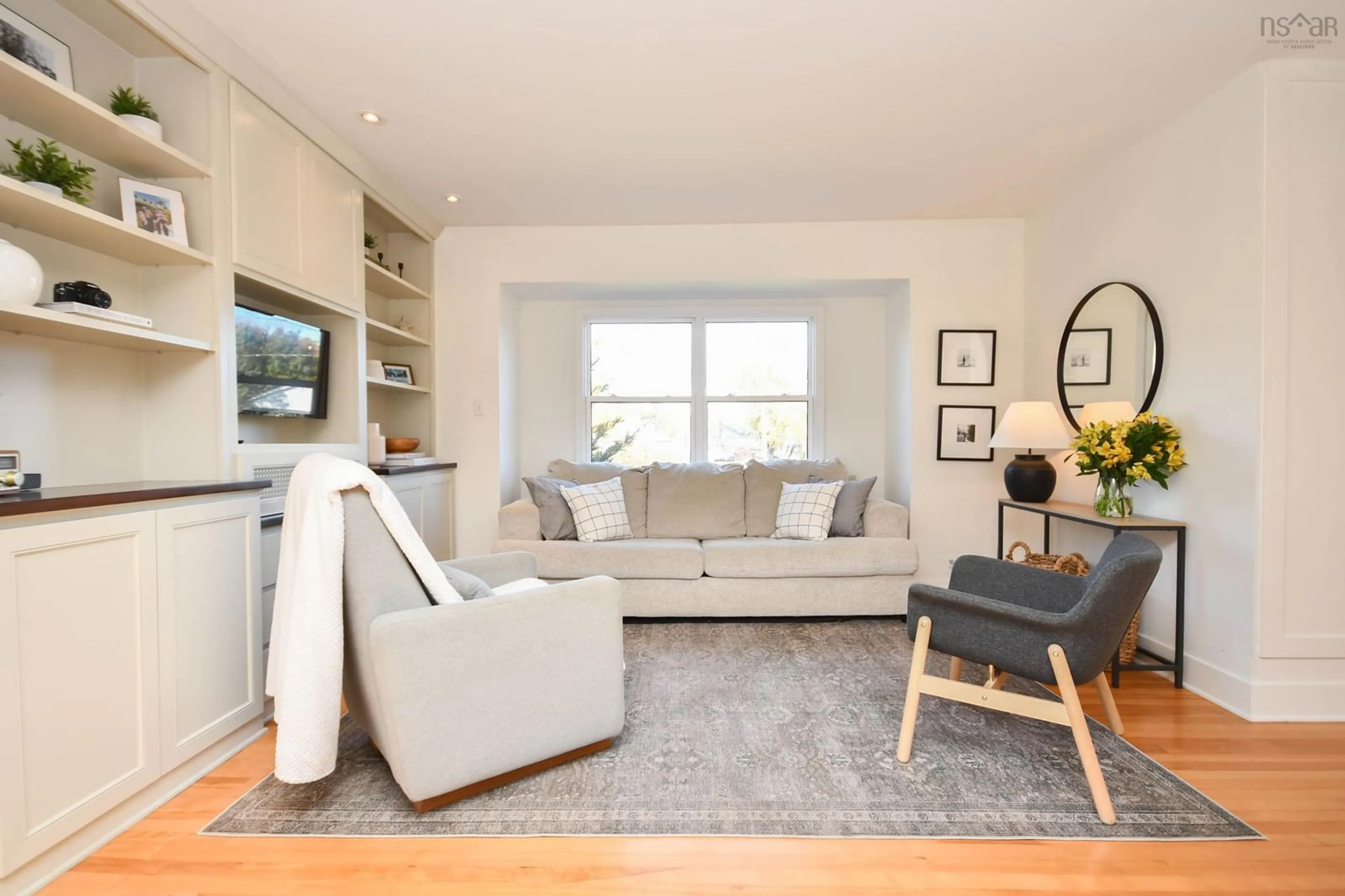 Living room with furniture, wood/laminate floor for 11 Walters St, Dartmouth Nova Scotia B2W 1S9