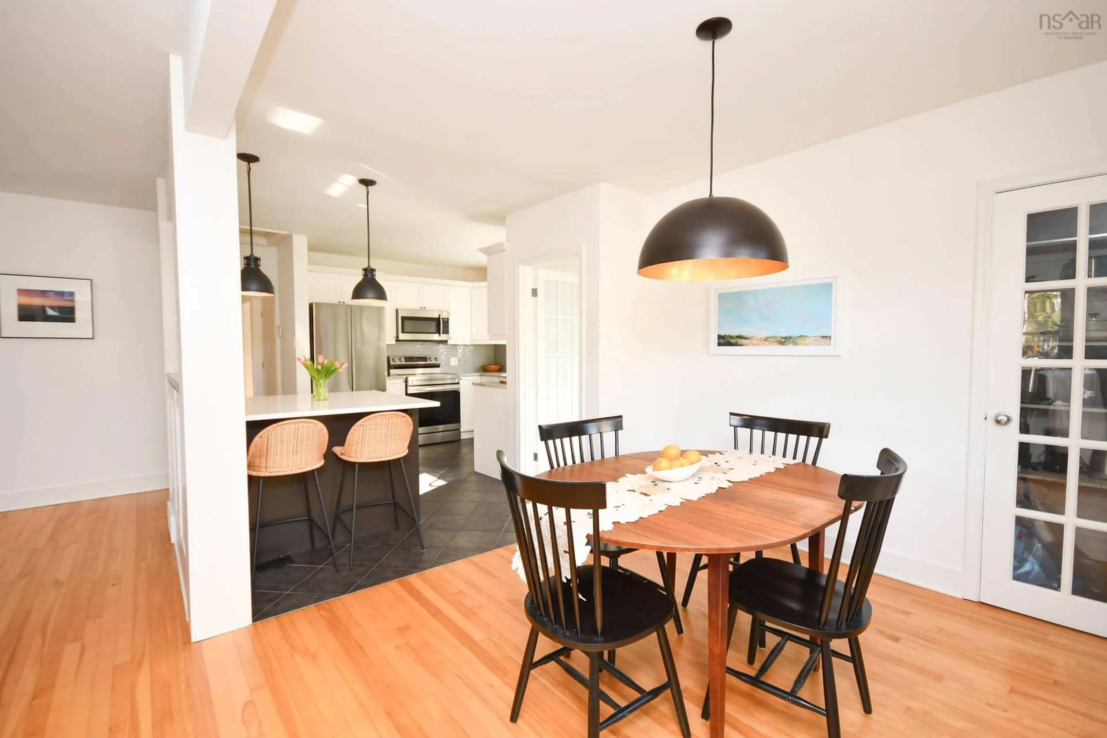 Open concept kitchen, wood/laminate floor for 11 Walters St, Dartmouth Nova Scotia B2W 1S9