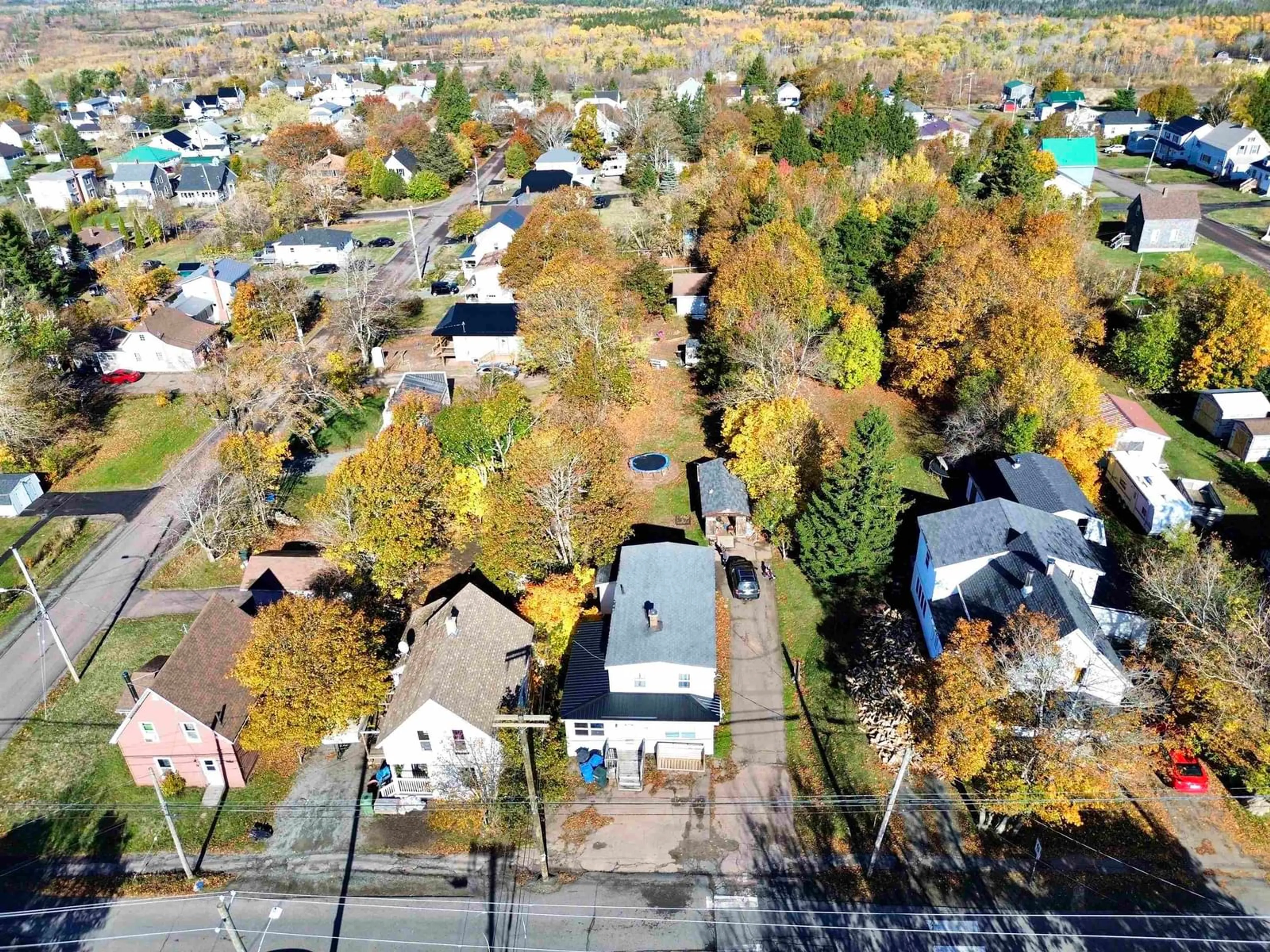 A pic from outside/outdoor area/front of a property/back of a property/a pic from drone, street for 128 Main St, Springhill Nova Scotia B0M 1X0