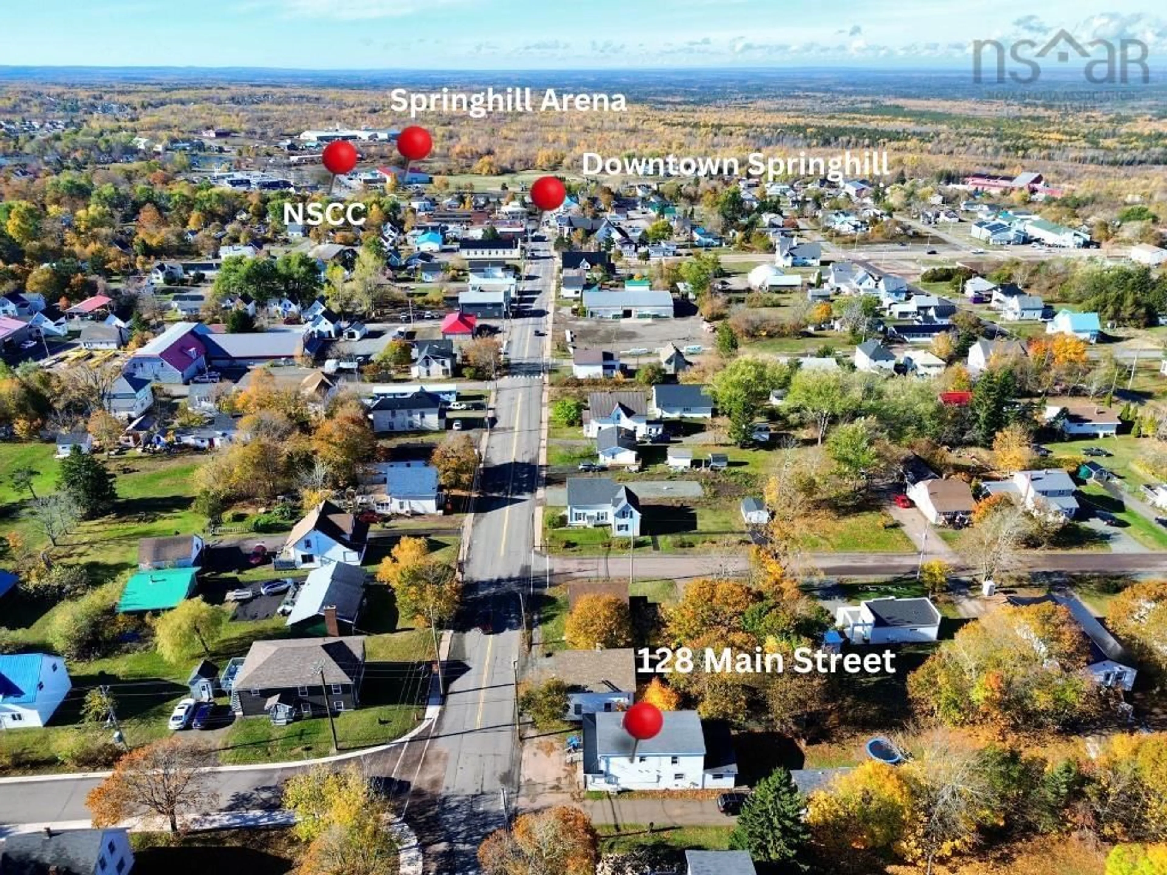 A pic from outside/outdoor area/front of a property/back of a property/a pic from drone, street for 128 Main St, Springhill Nova Scotia B0M 1X0