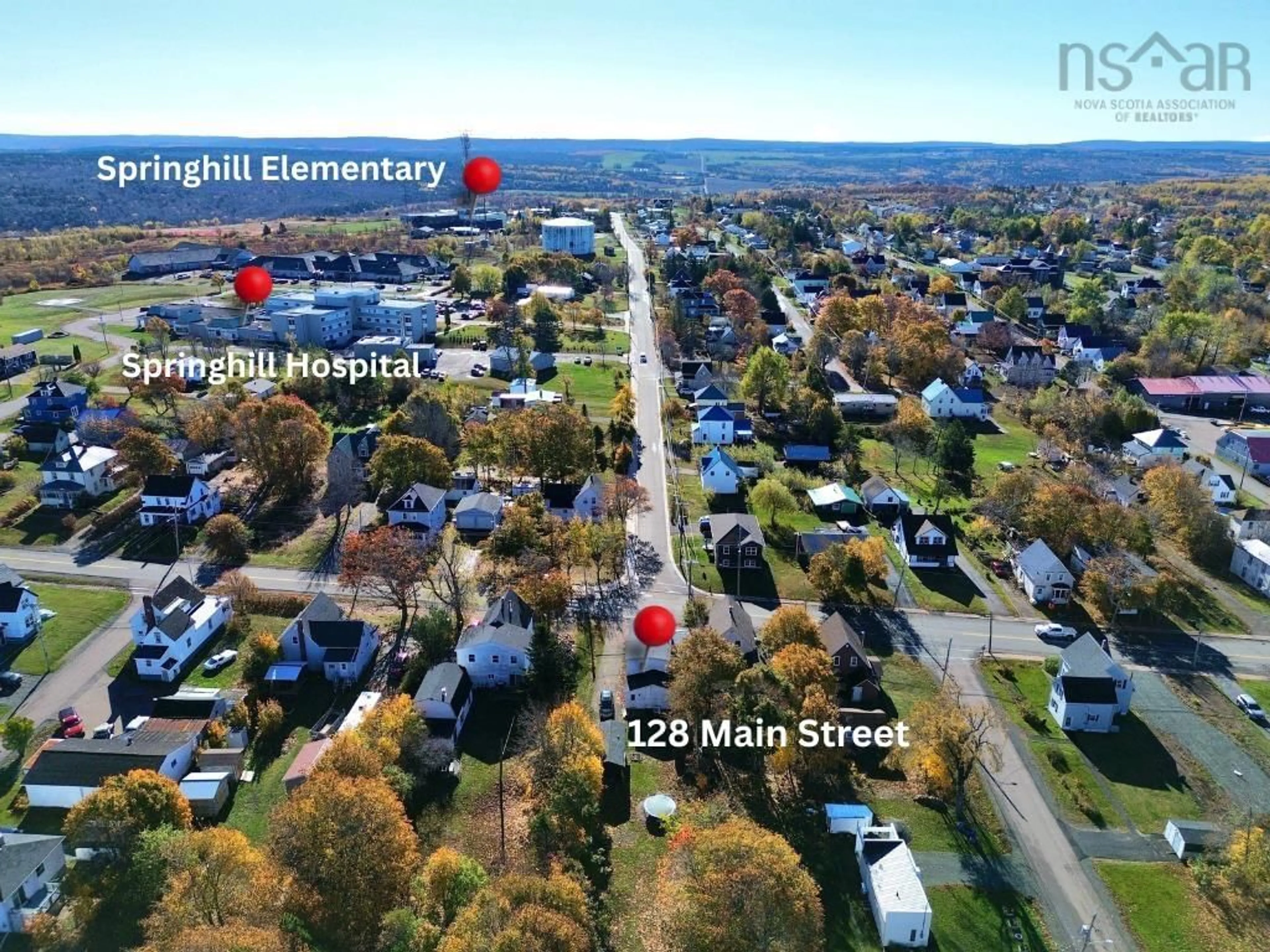 A pic from outside/outdoor area/front of a property/back of a property/a pic from drone, street for 128 Main St, Springhill Nova Scotia B0M 1X0